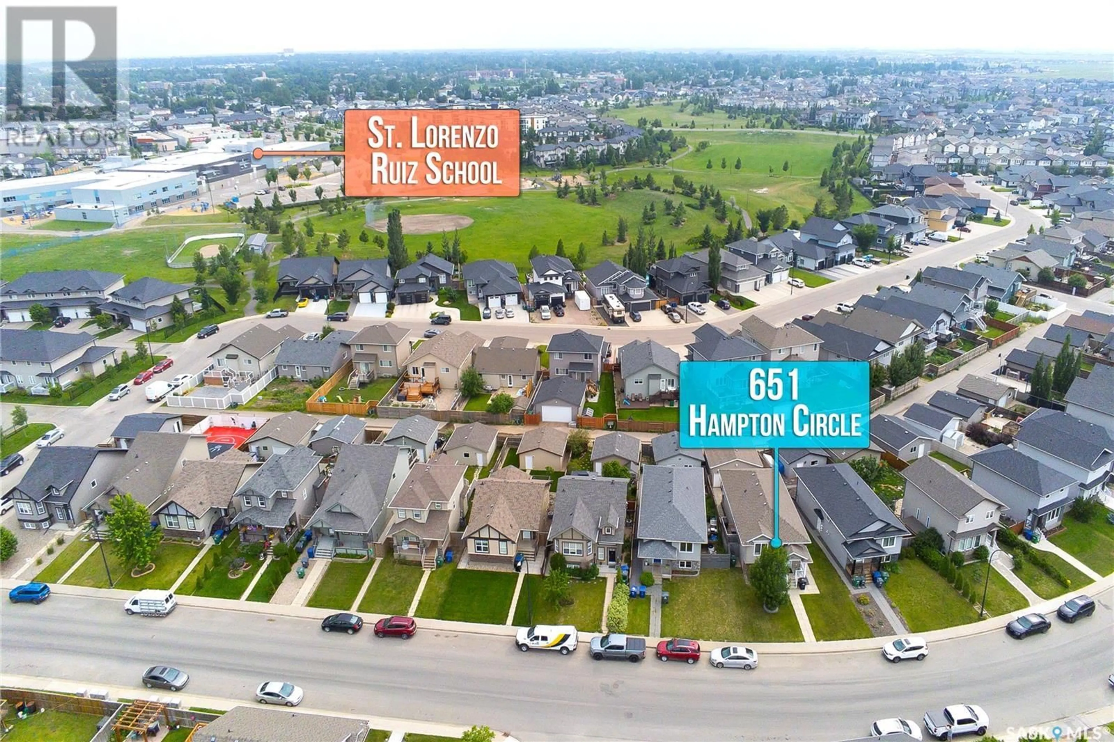 A pic from outside/outdoor area/front of a property/back of a property/a pic from drone, street for 651 HAMPTON CIRCLE, Saskatoon Saskatchewan S7R0K1