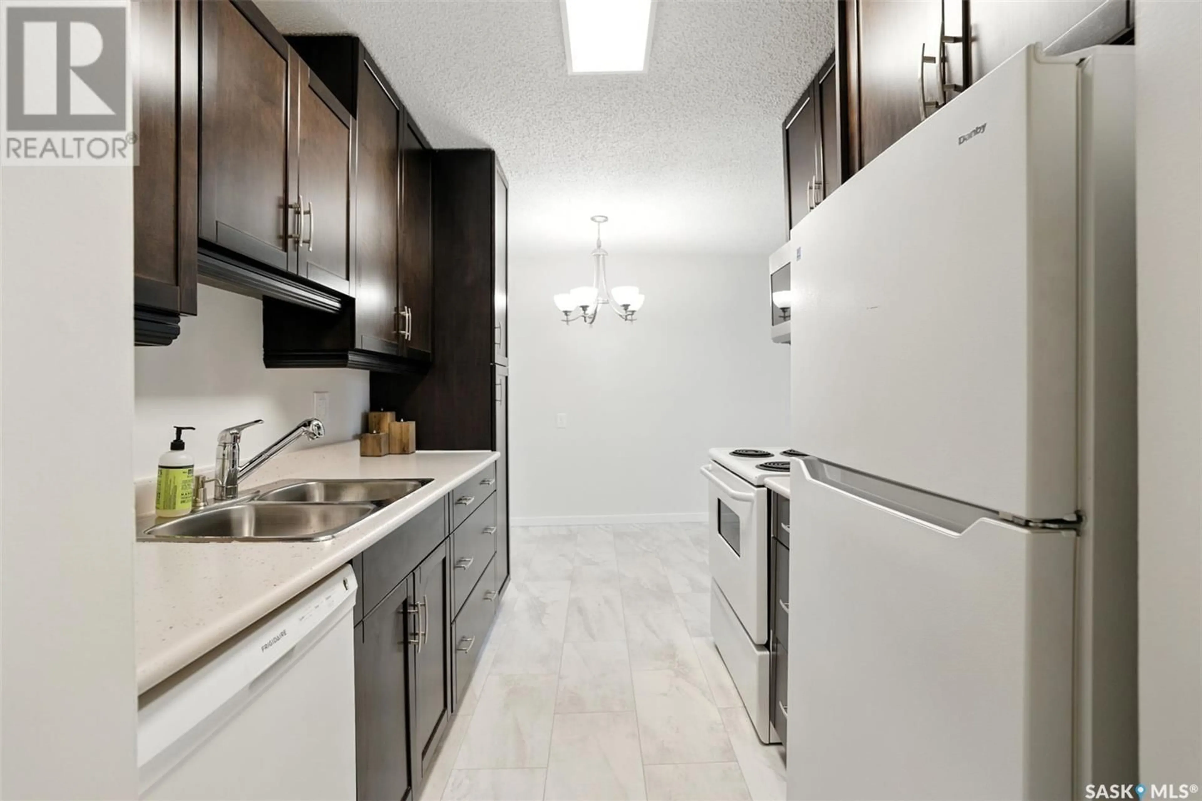 Standard kitchen, ceramic/tile floor for 103 - 3302 33RD STREET, Saskatoon Saskatchewan S7L6S5