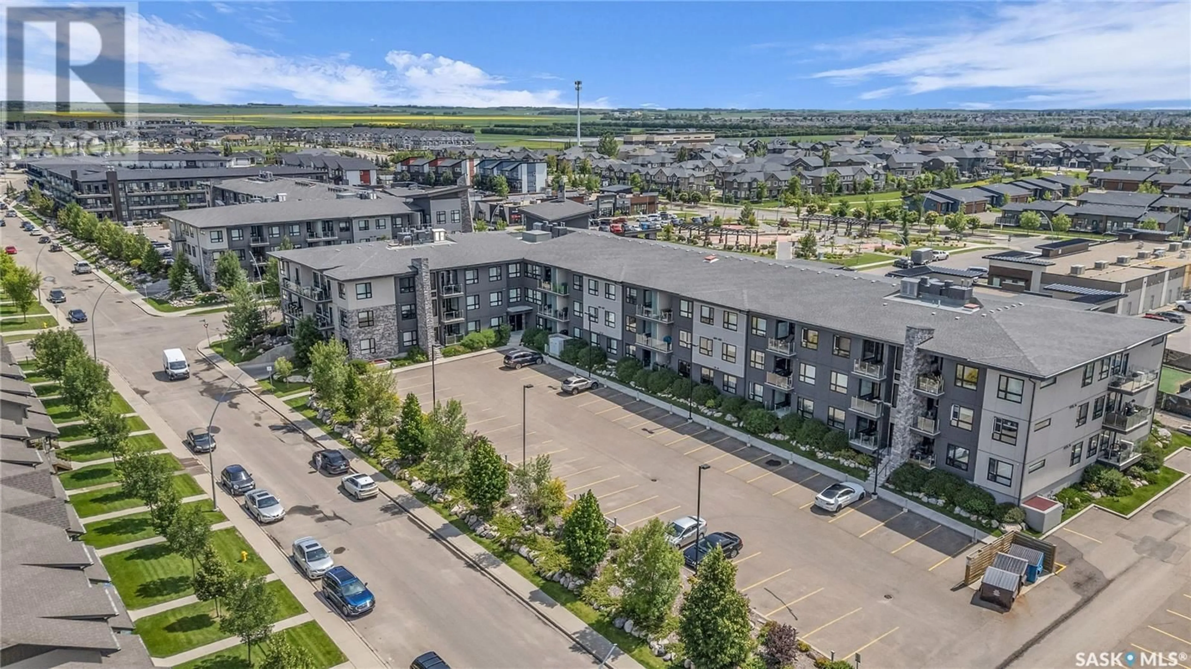 A pic from outside/outdoor area/front of a property/back of a property/a pic from drone, city buildings view from balcony for 222 235 EVERGREEN SQUARE, Saskatoon Saskatchewan S7W0P9
