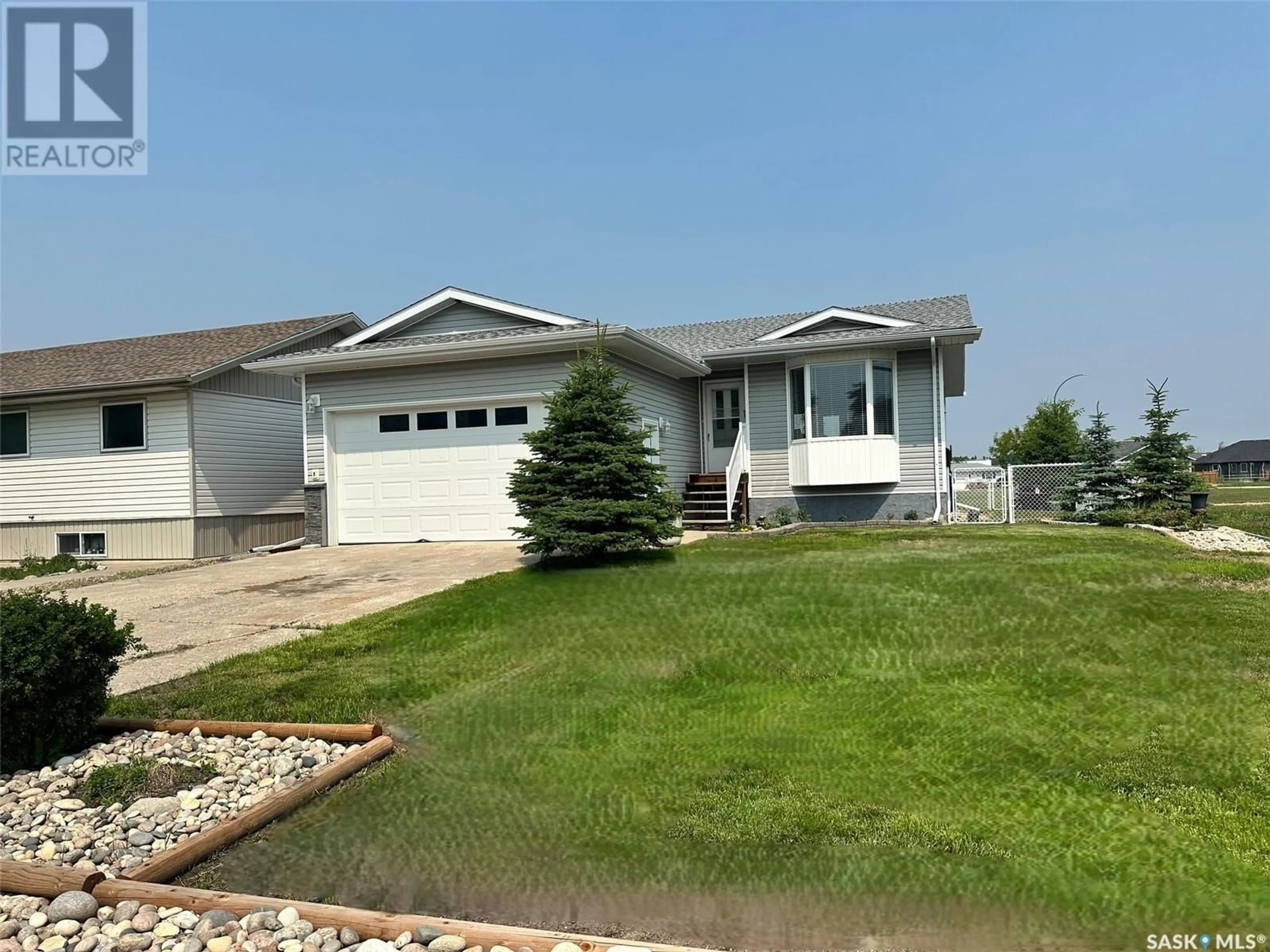 Home with vinyl exterior material, street for 534 5TH AVENUE, Hudson Bay Saskatchewan S0E0Y0