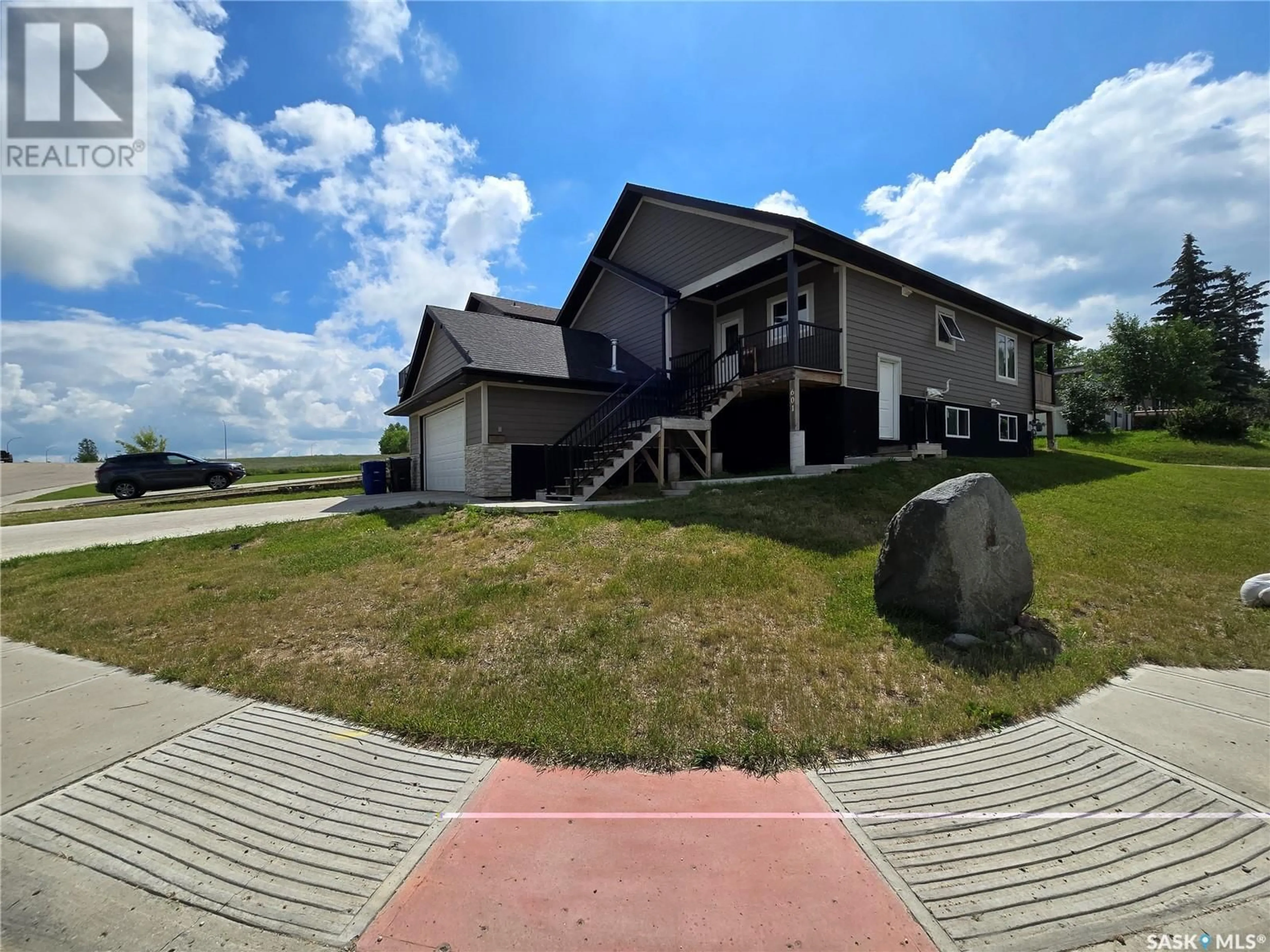 A pic from outside/outdoor area/front of a property/back of a property/a pic from drone, unknown for 601 CONFEDERATION DRIVE, Weyburn Saskatchewan S4H3R1