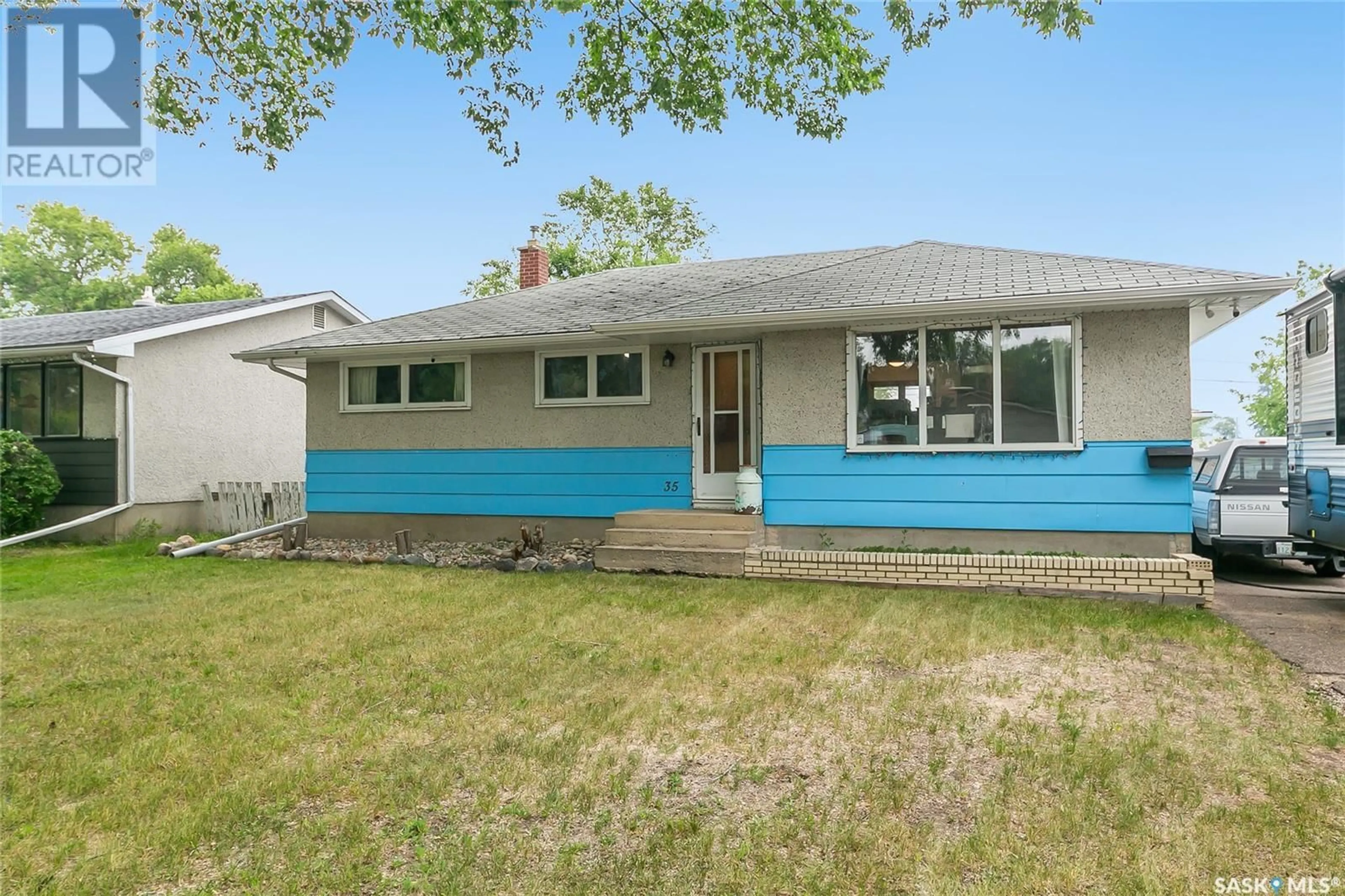 Home with vinyl exterior material, street for 35 LAIRD CRESCENT, Regina Saskatchewan S4R4N7