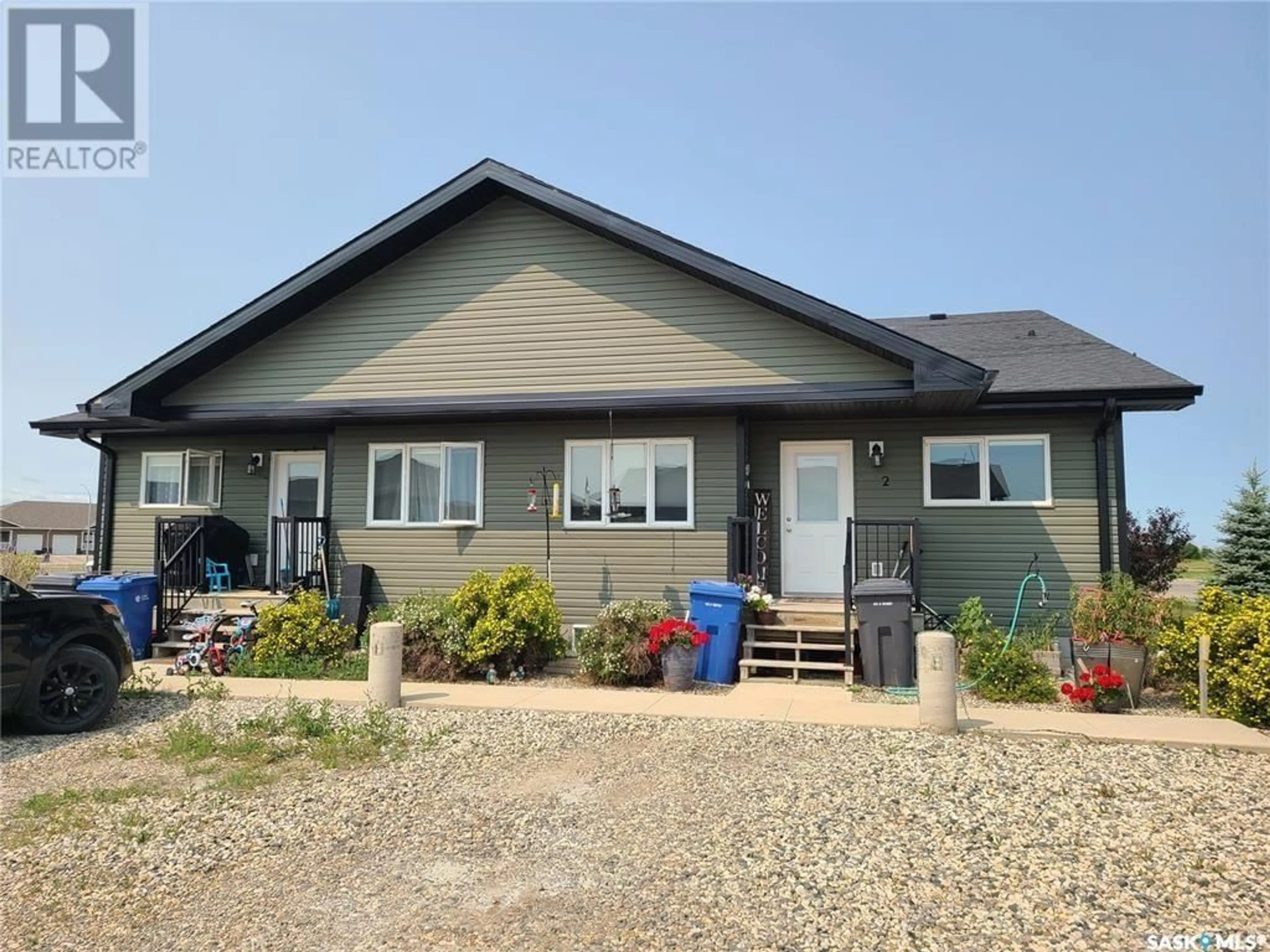 Home with vinyl exterior material, street for 3 CARLYLE AVENUE, Carlyle Saskatchewan S0C0R0