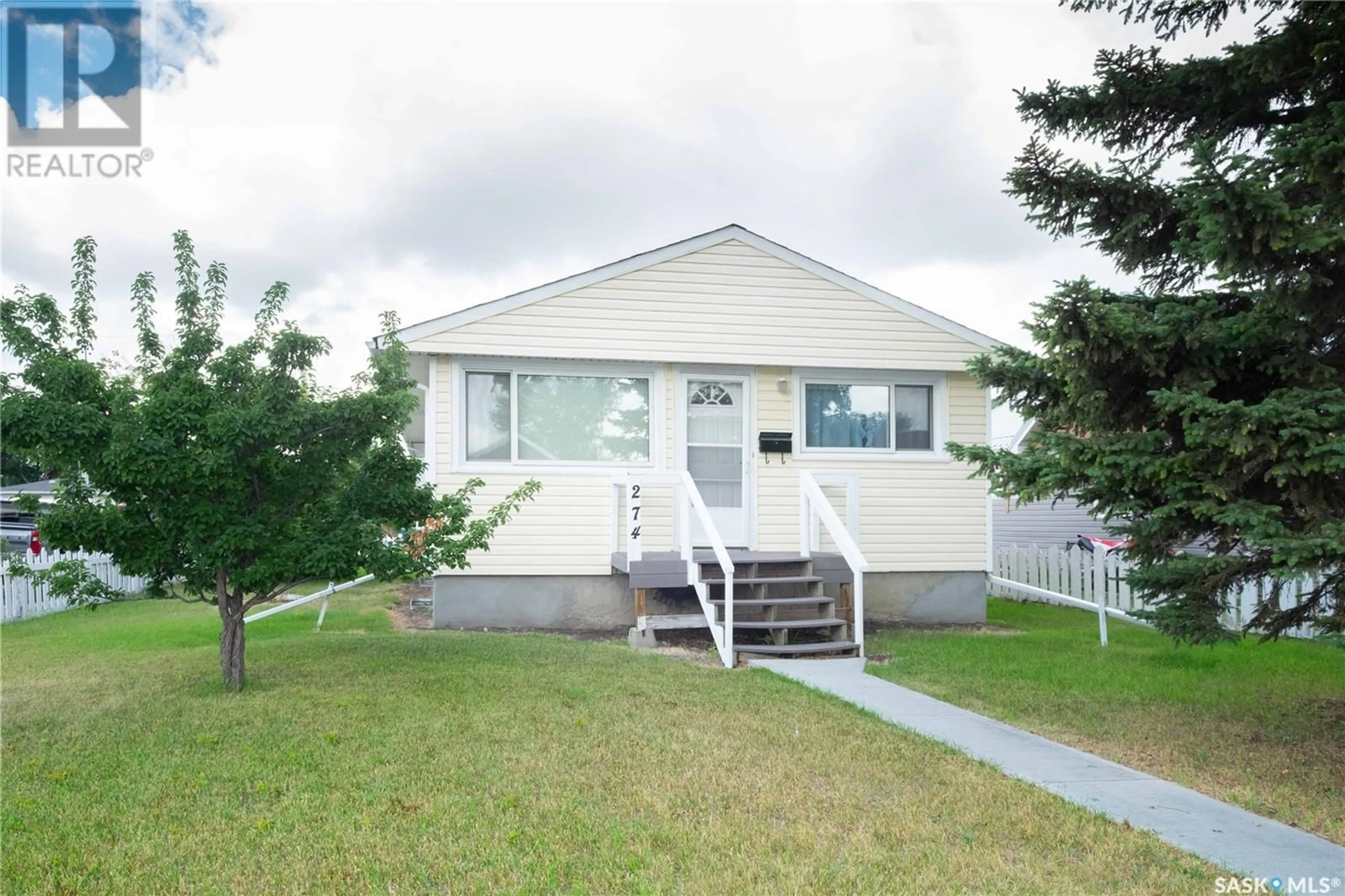 Home with vinyl exterior material, street for 274 TORONTO STREET, Regina Saskatchewan S4R1L9