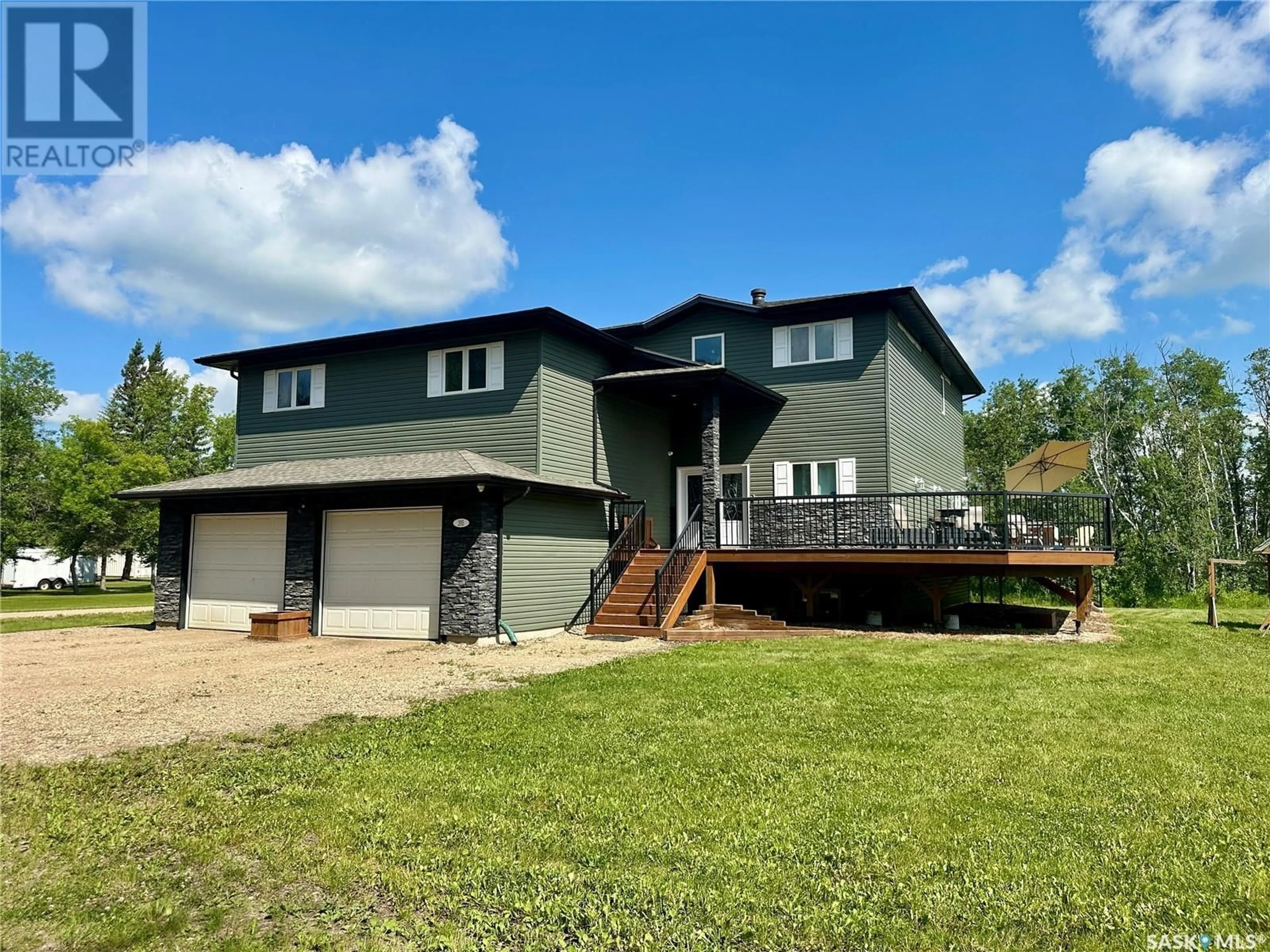 Home with vinyl exterior material, unknown for 205 ROBERTS AVENUE, Canora Saskatchewan S0A0L0