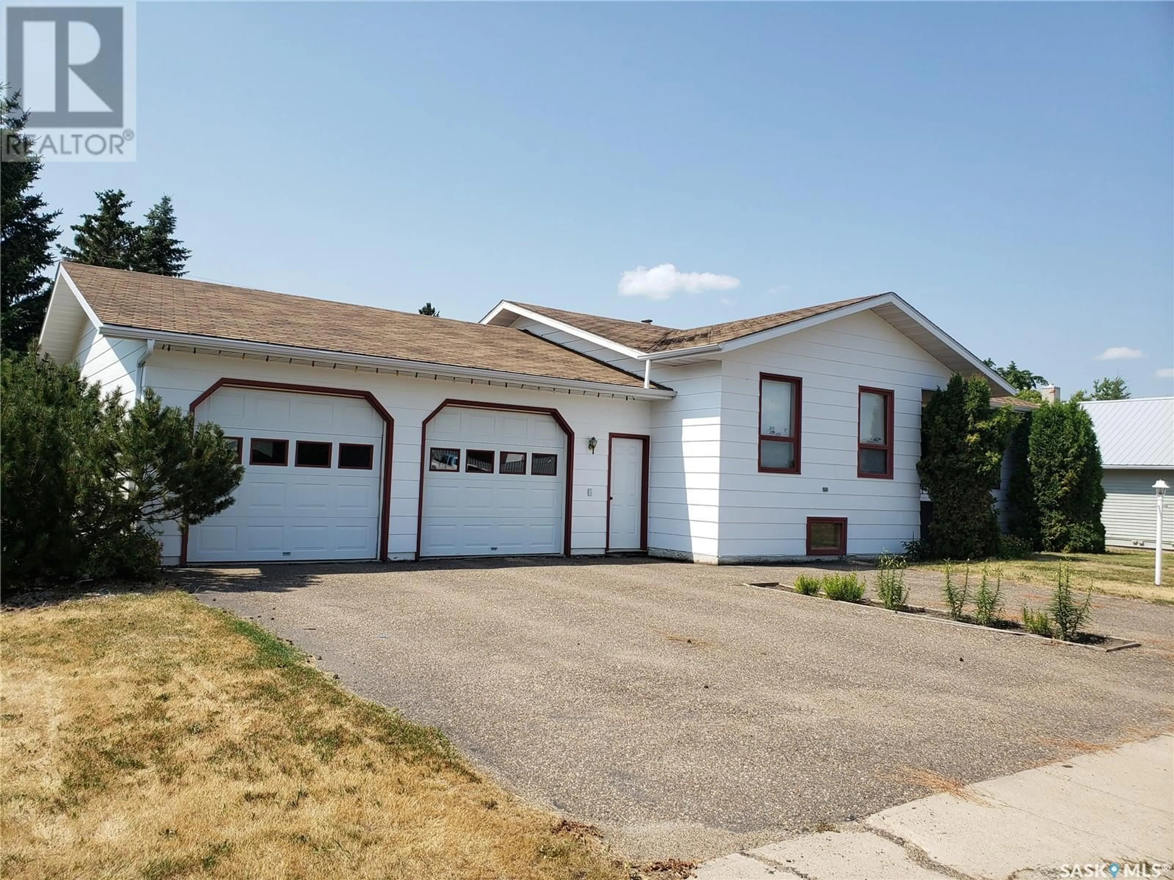 Home with vinyl exterior material, street for 205 2ND STREET, Wilkie Saskatchewan S0K4W0