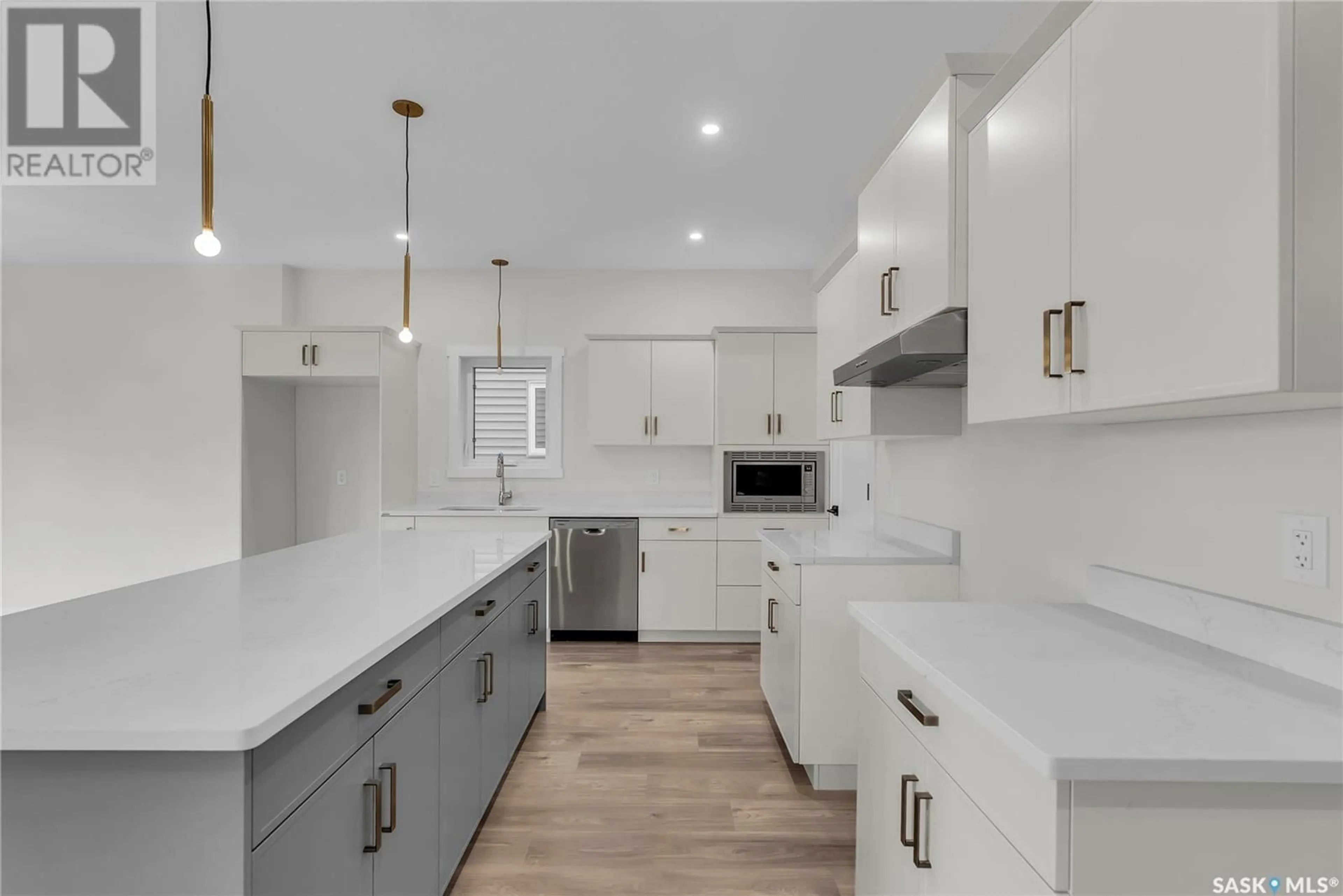 Open concept kitchen, ceramic/tile floor for 303 ASOKAN STREET, Saskatoon Saskatchewan S7V1S4