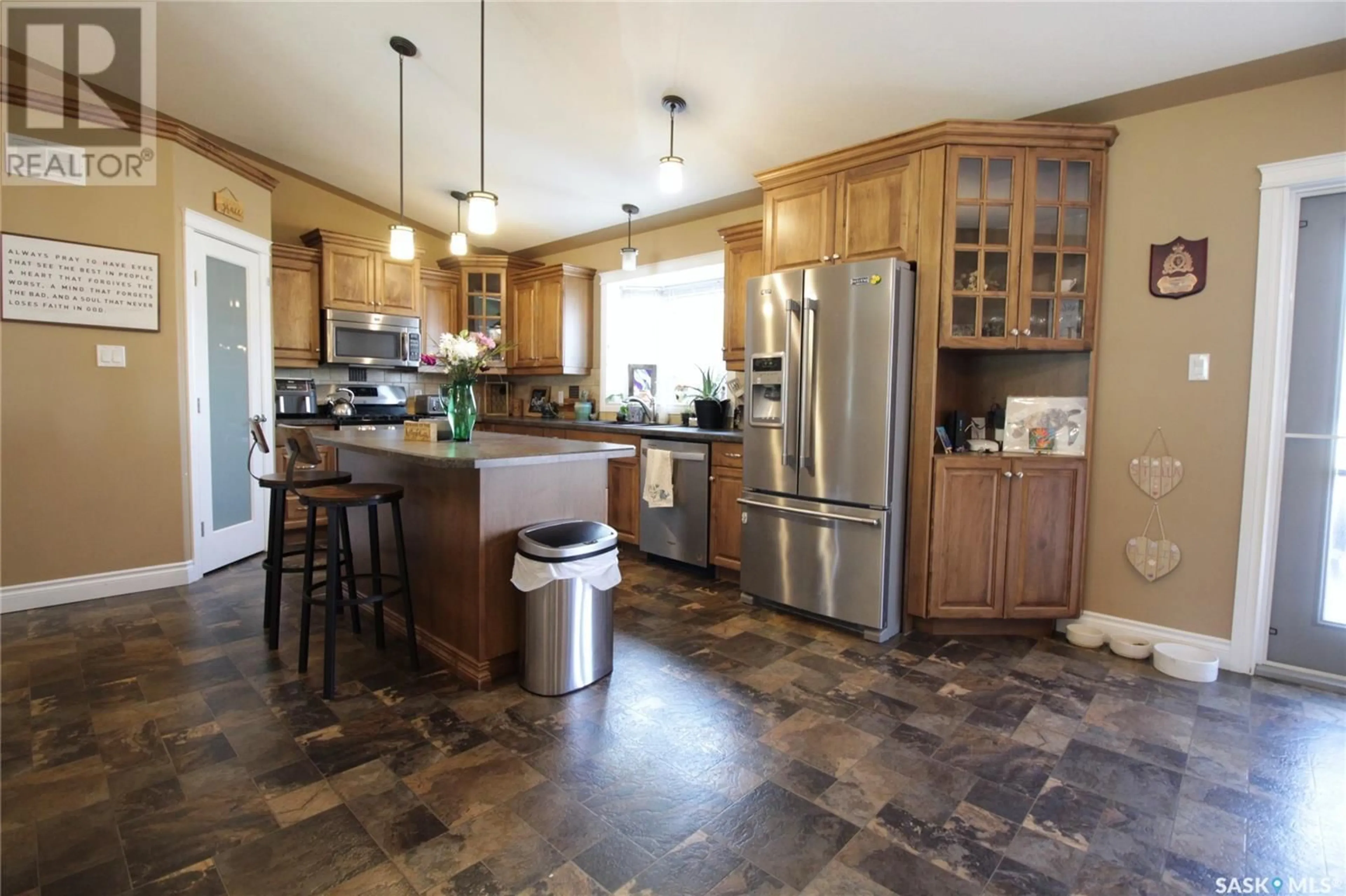 Open concept kitchen, ceramic/tile floor for 513 HENRY STREET, Moosomin Saskatchewan S0G3N0