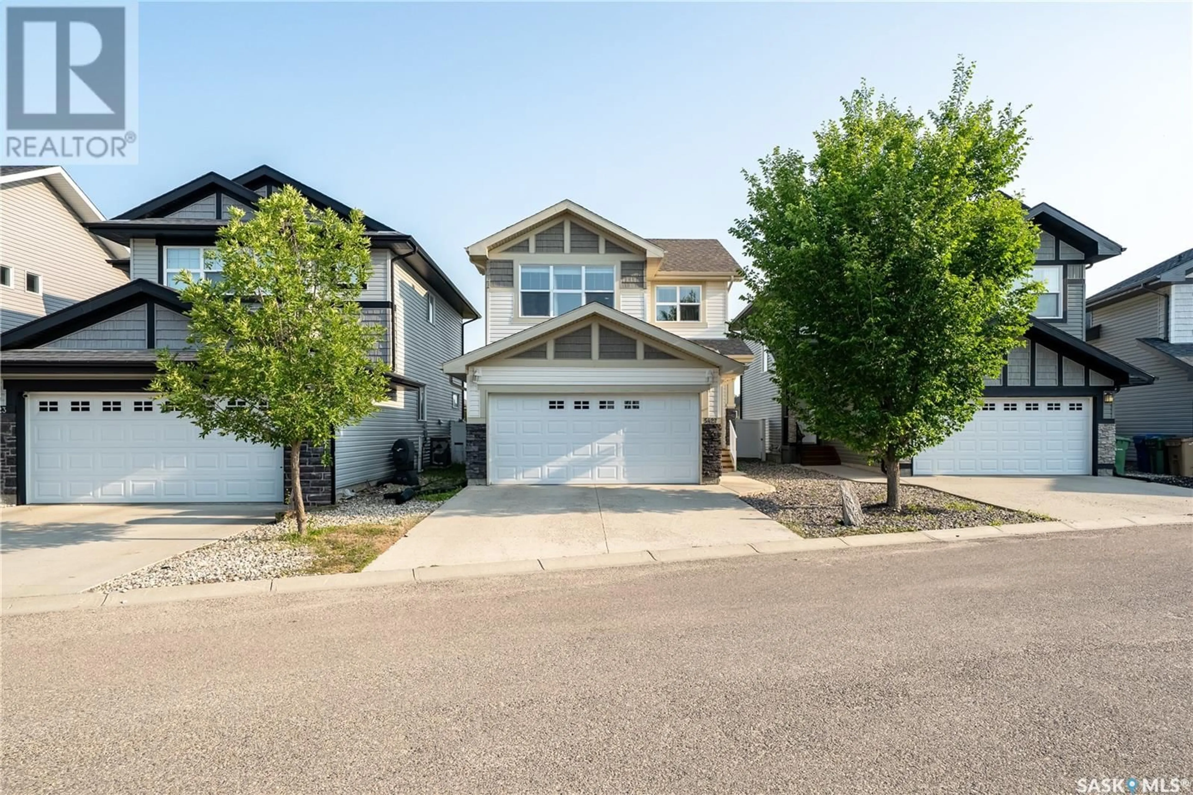 Home with vinyl exterior material, street for 5427 UNIVERSAL CRESCENT, Regina Saskatchewan S4W0K8