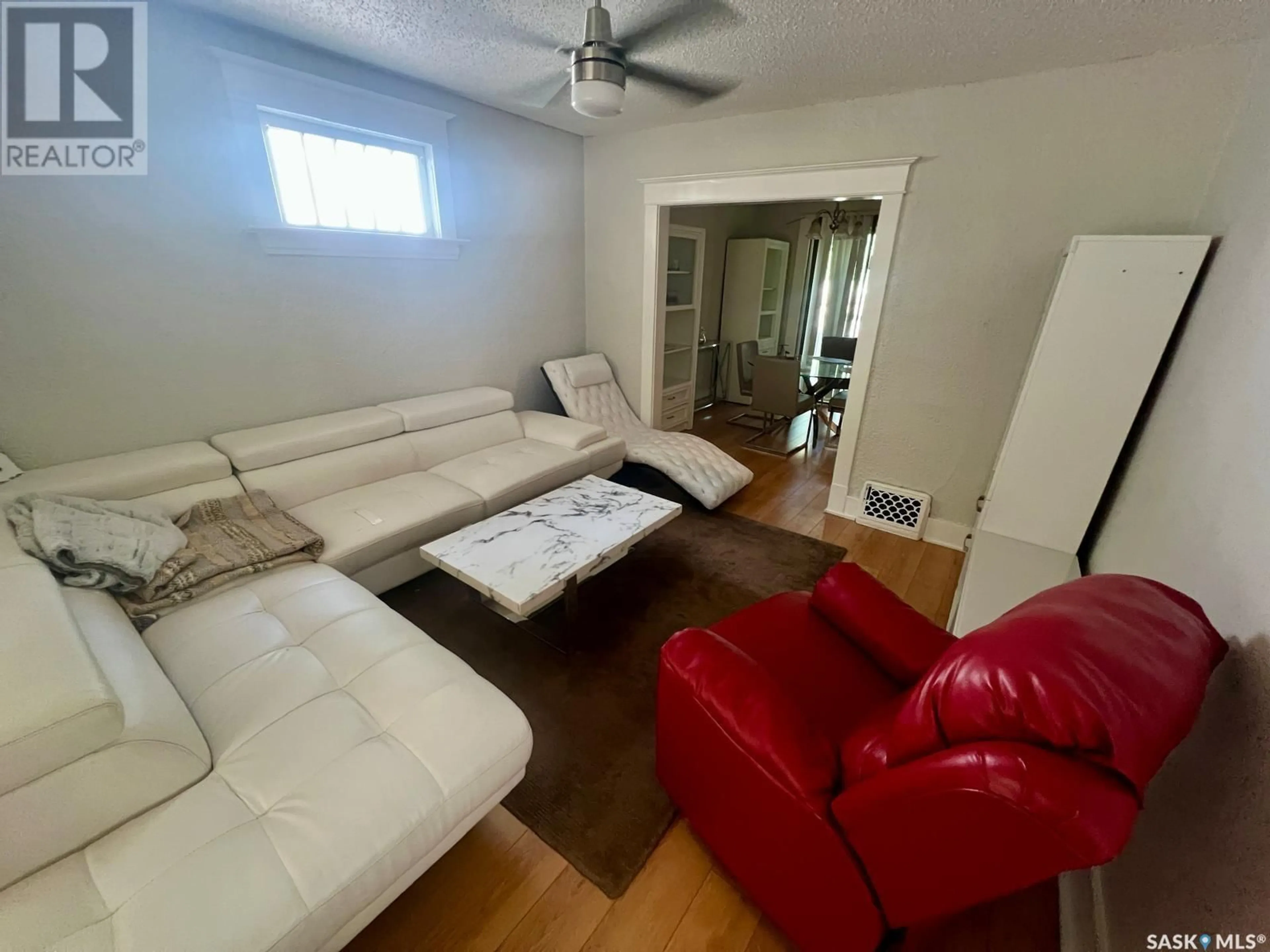 Living room with furniture, unknown for 1153 ELPHINSTONE STREET, Regina Saskatchewan S4T3M2