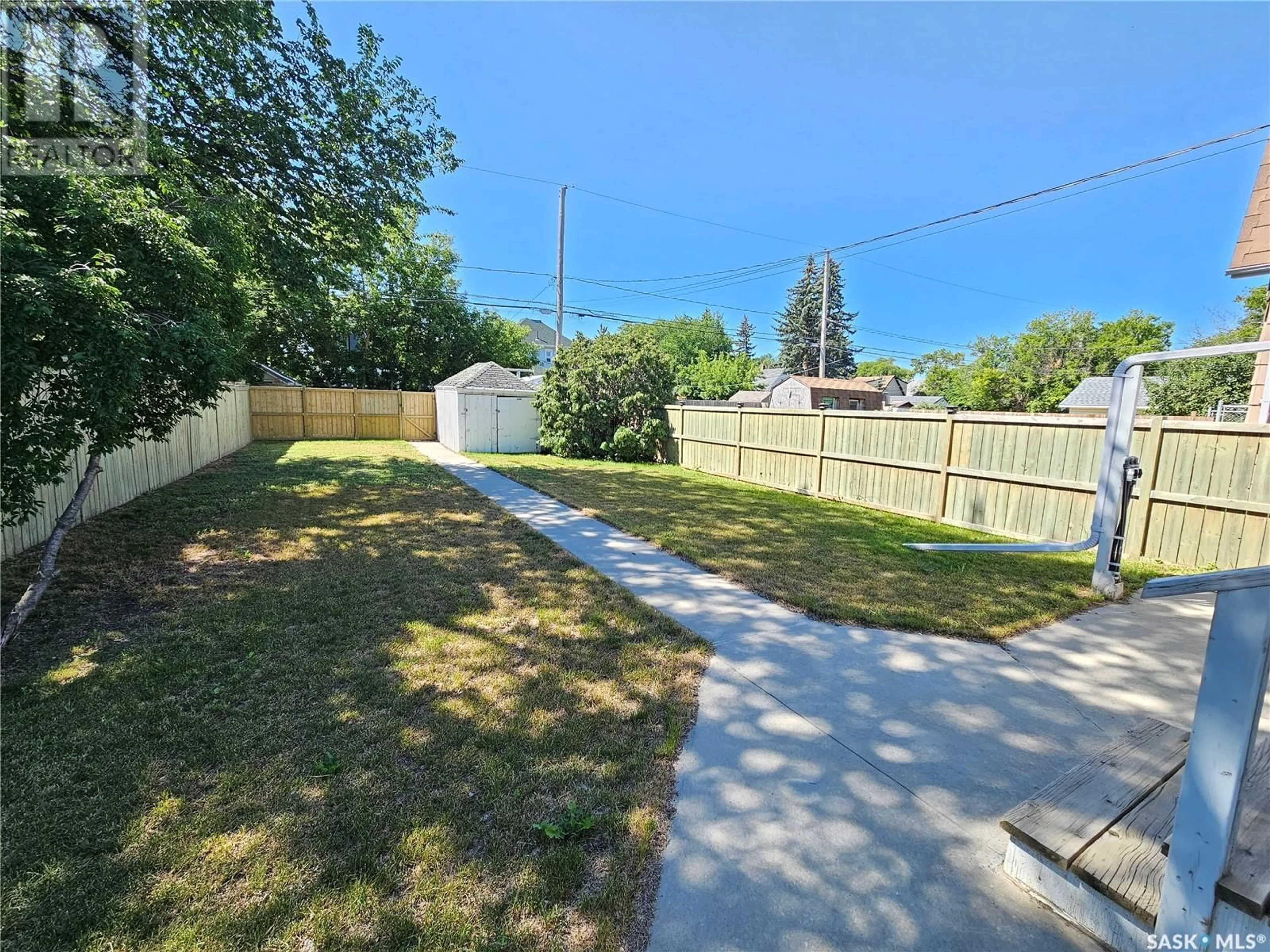 A pic from outside/outdoor area/front of a property/back of a property/a pic from drone, street for 413 ATHABASCA STREET, Moose Jaw Saskatchewan S6H2C4