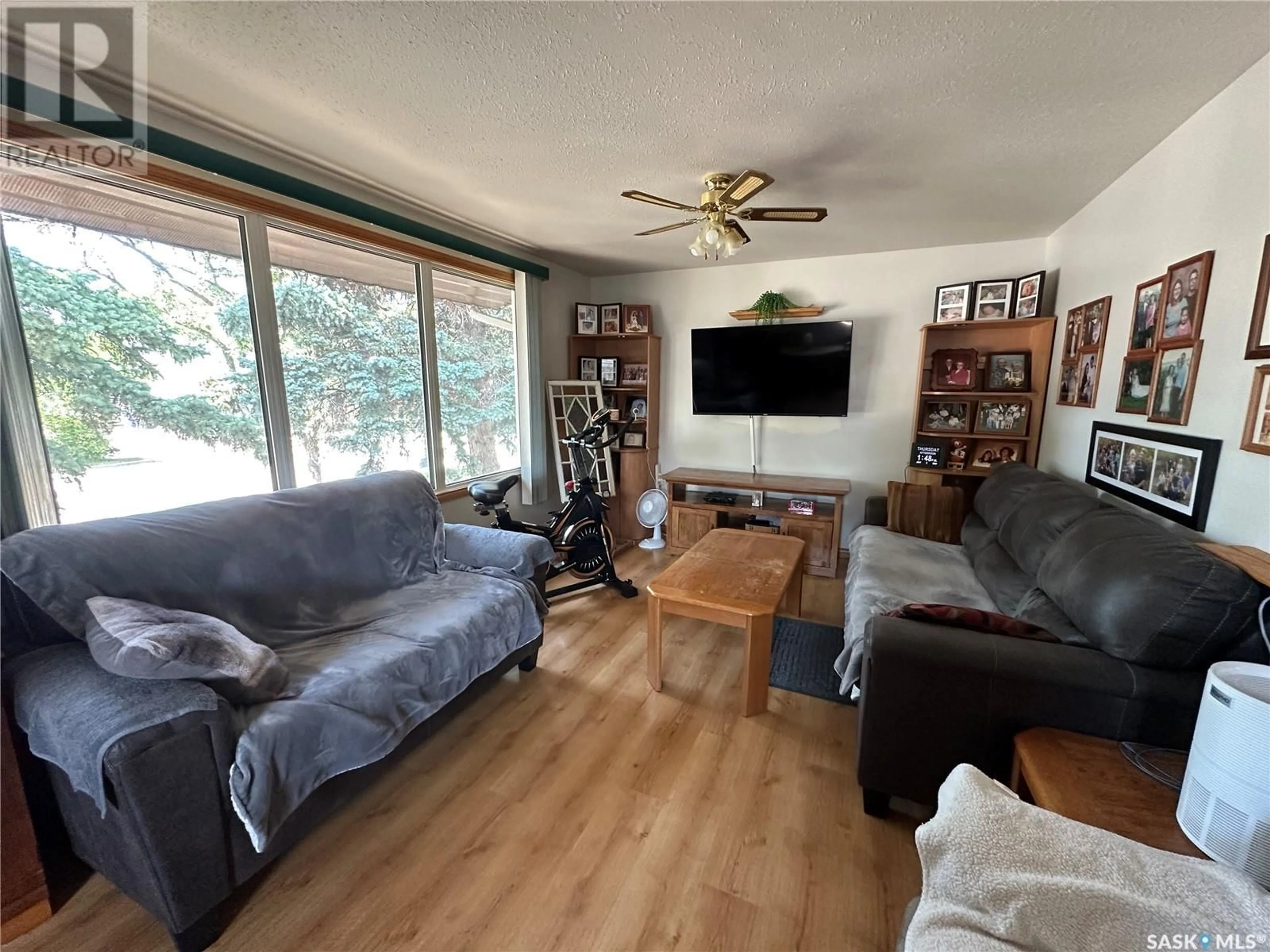 Living room with furniture, unknown for 18 9TH STREET, Weyburn Saskatchewan S4H1E5