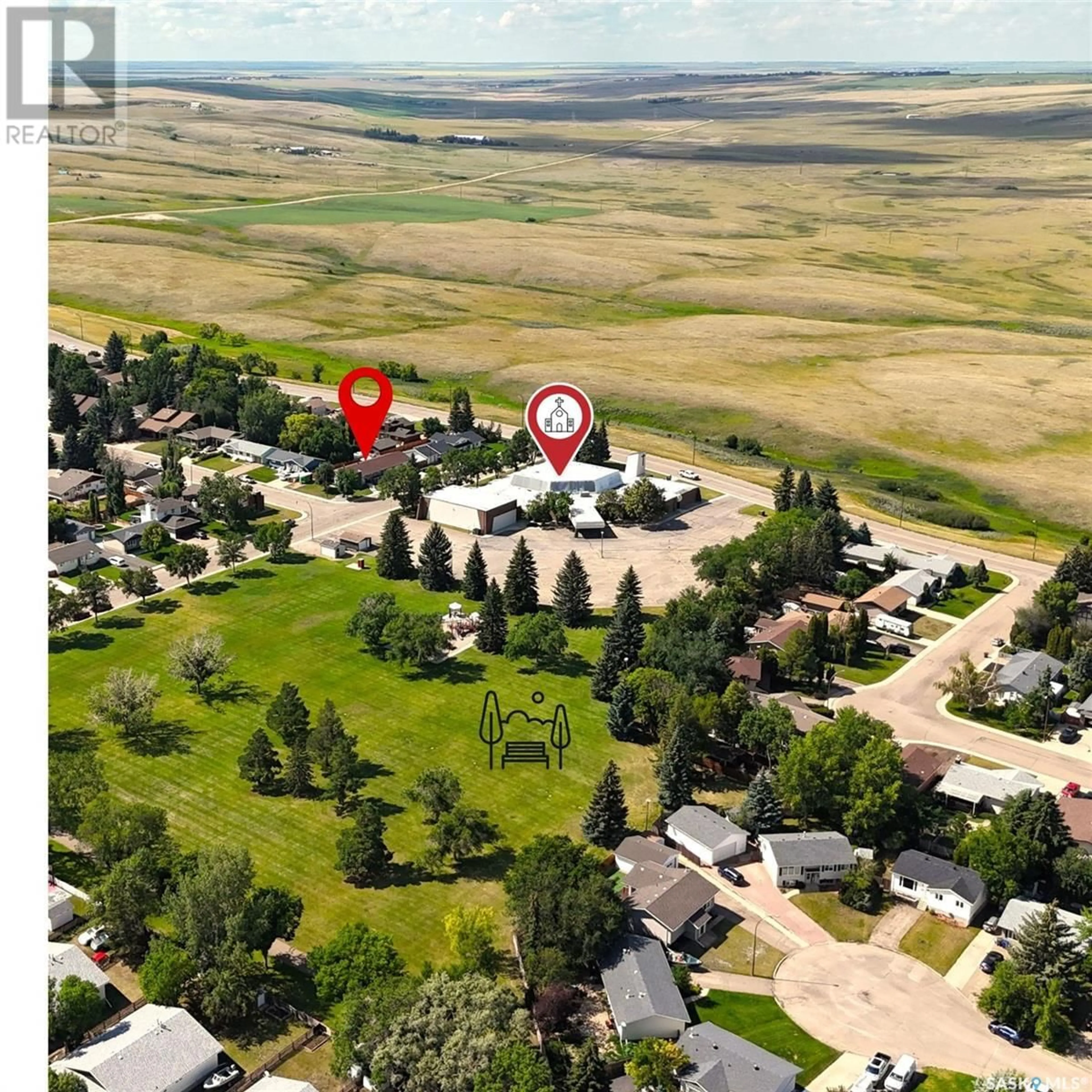 A pic from outside/outdoor area/front of a property/back of a property/a pic from drone, water/lake/river/ocean view for 396 WALSH TRAIL, Swift Current Saskatchewan S9H4N2