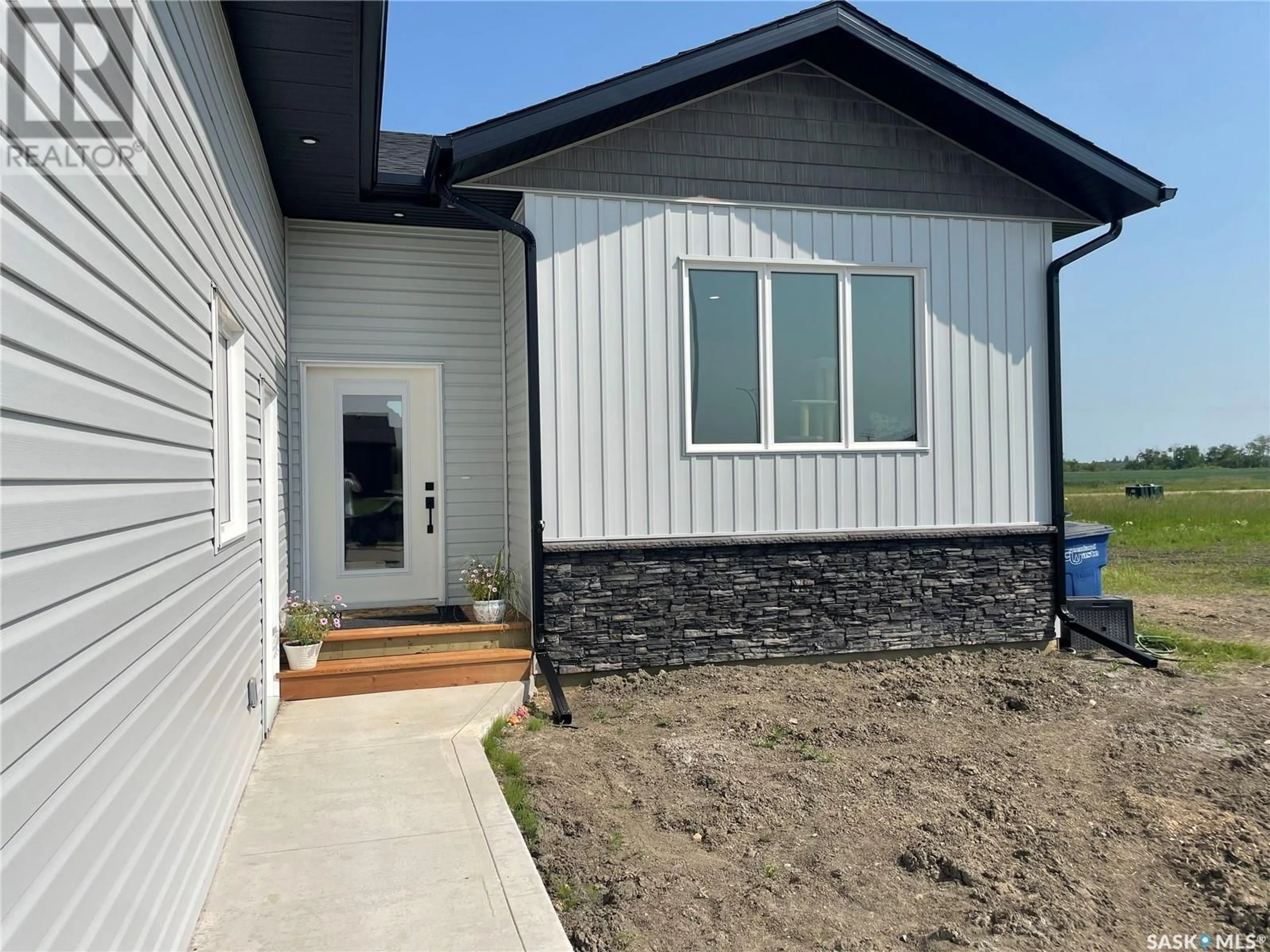Home with vinyl exterior material, unknown for 715 DOGHIDE DRIVE, Tisdale Saskatchewan S0E1T0