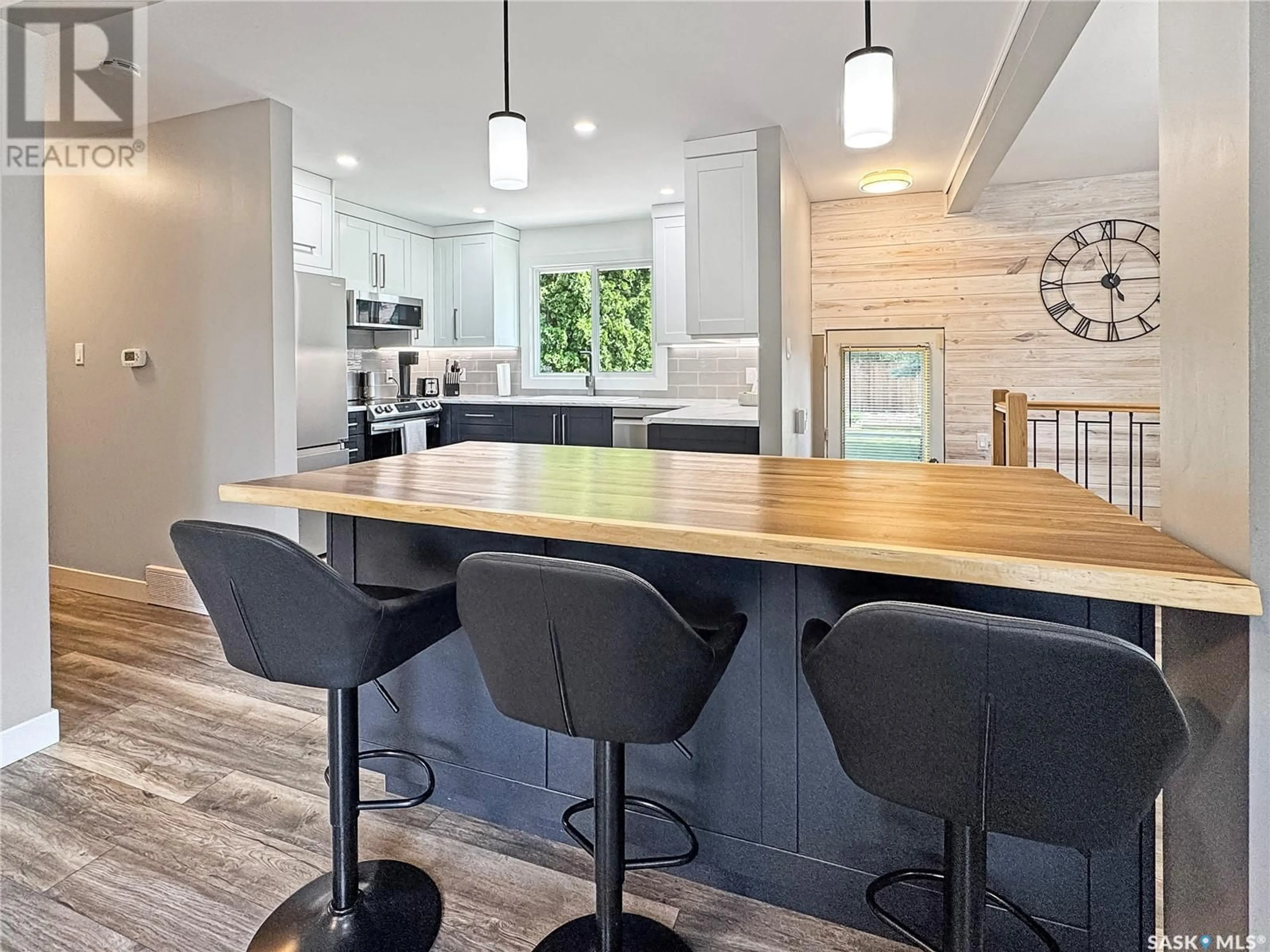 Contemporary kitchen, wood/laminate floor for 1562 91ST STREET, North Battleford Saskatchewan S9A0A1