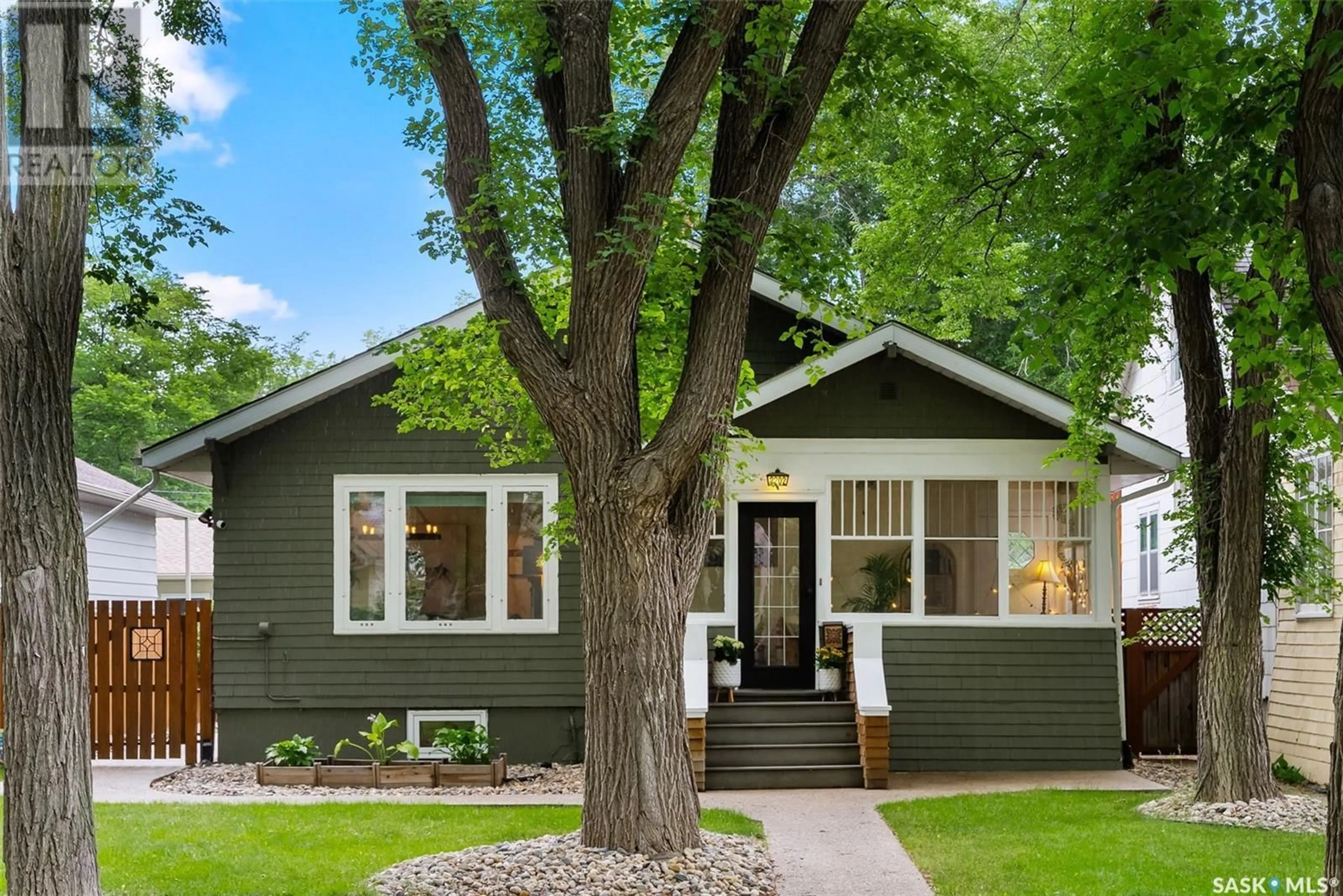 Home with vinyl exterior material, street for 2202 ATHOL STREET, Regina Saskatchewan S4T3E9