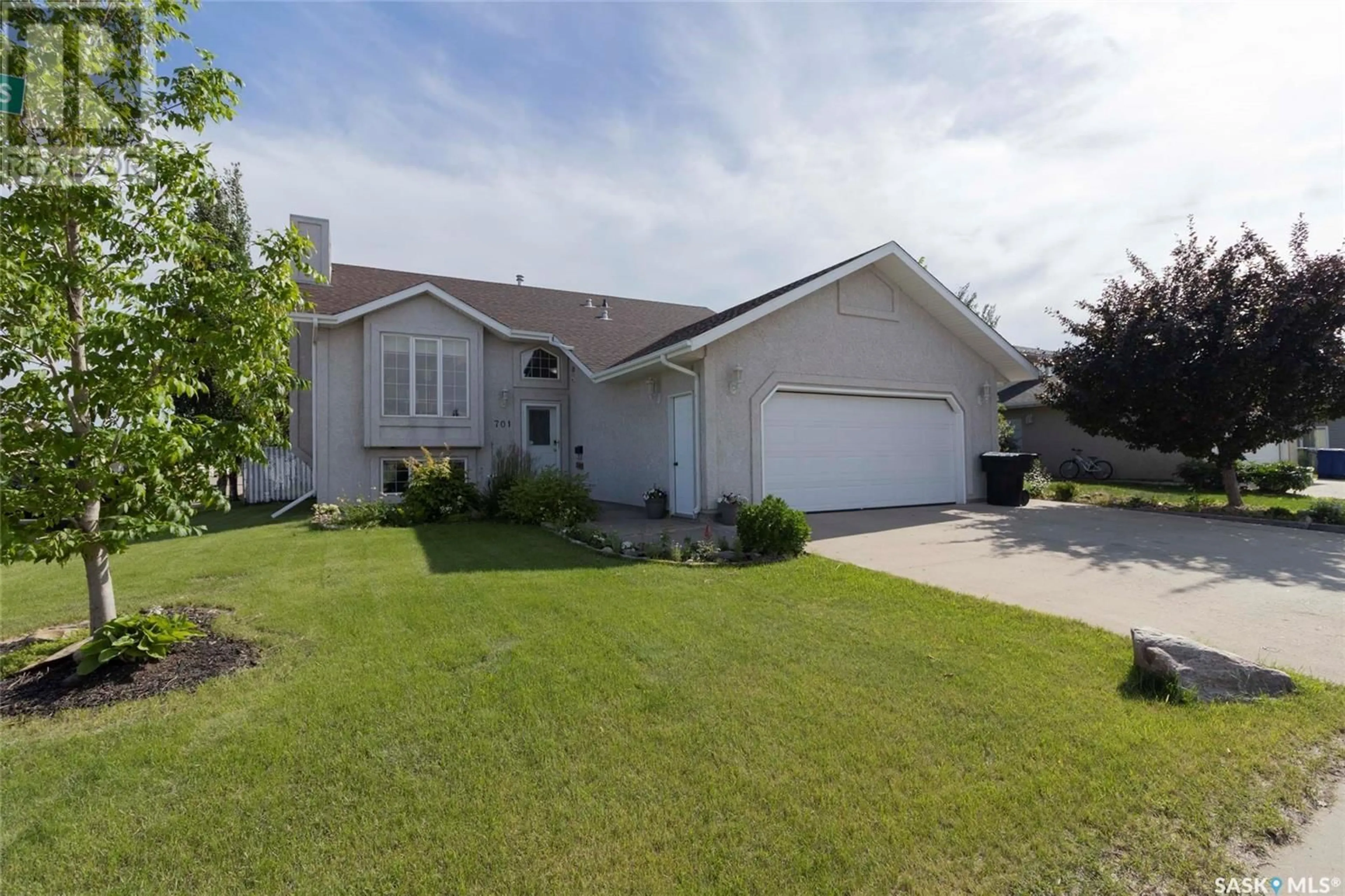 Home with vinyl exterior material, street for 701 SLATER CRESCENT, Martensville Saskatchewan S0K2T0