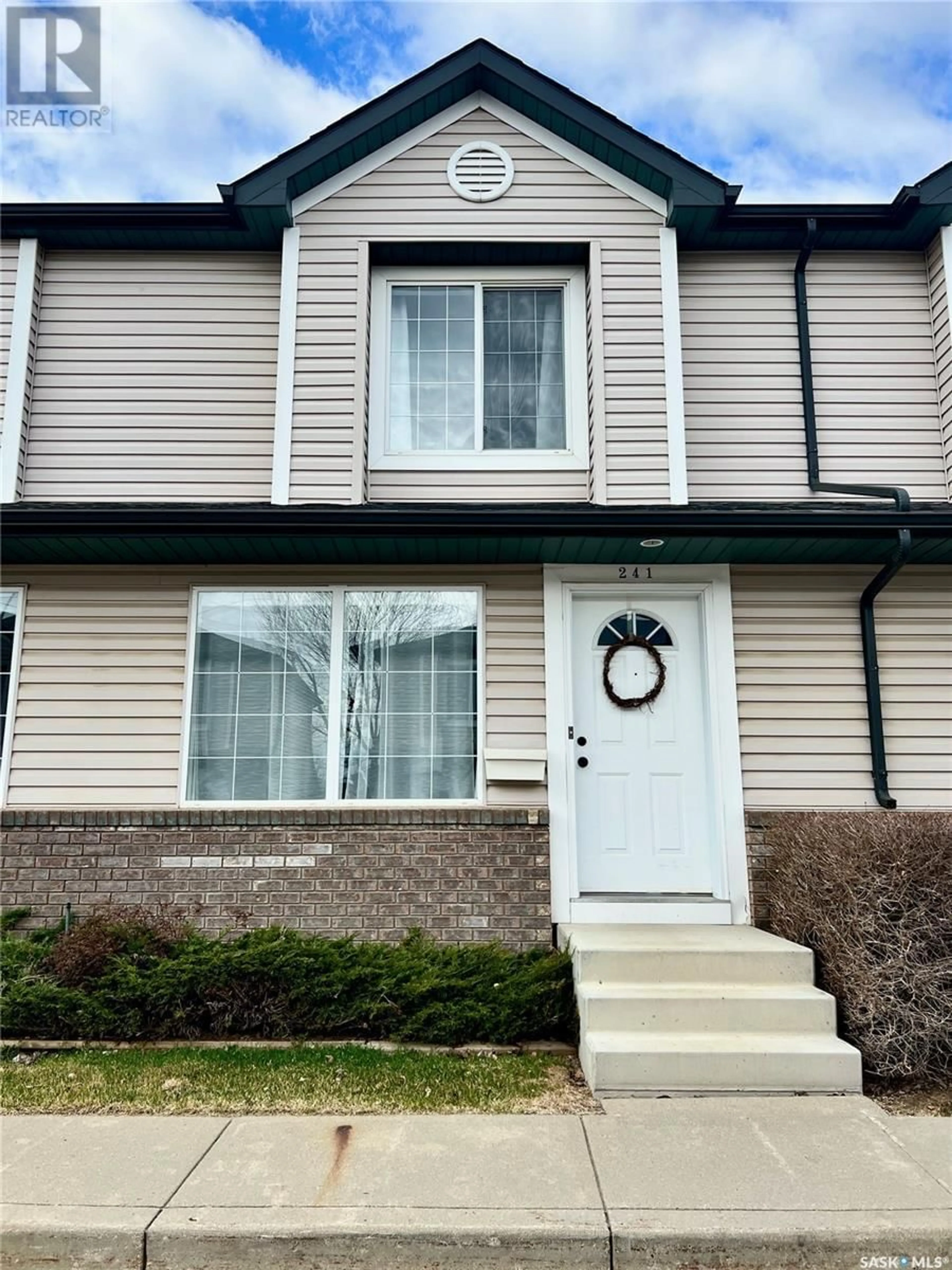 Home with vinyl exterior material, street for 670 - 241 KENDERDINE ROAD, Saskatoon Saskatchewan S7N4W5