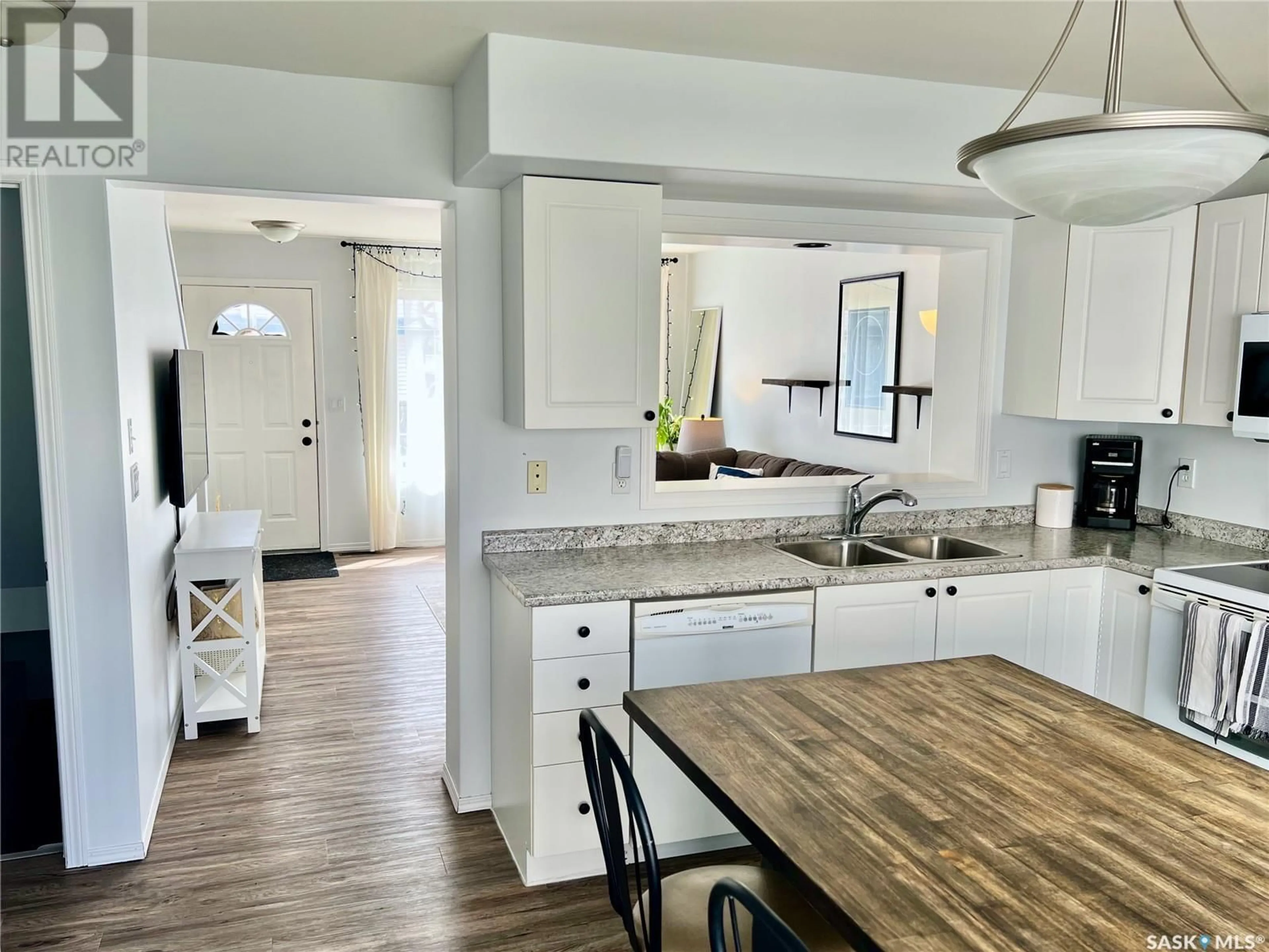 Open concept kitchen, ceramic/tile floor for 670 - 241 KENDERDINE ROAD, Saskatoon Saskatchewan S7N4W5