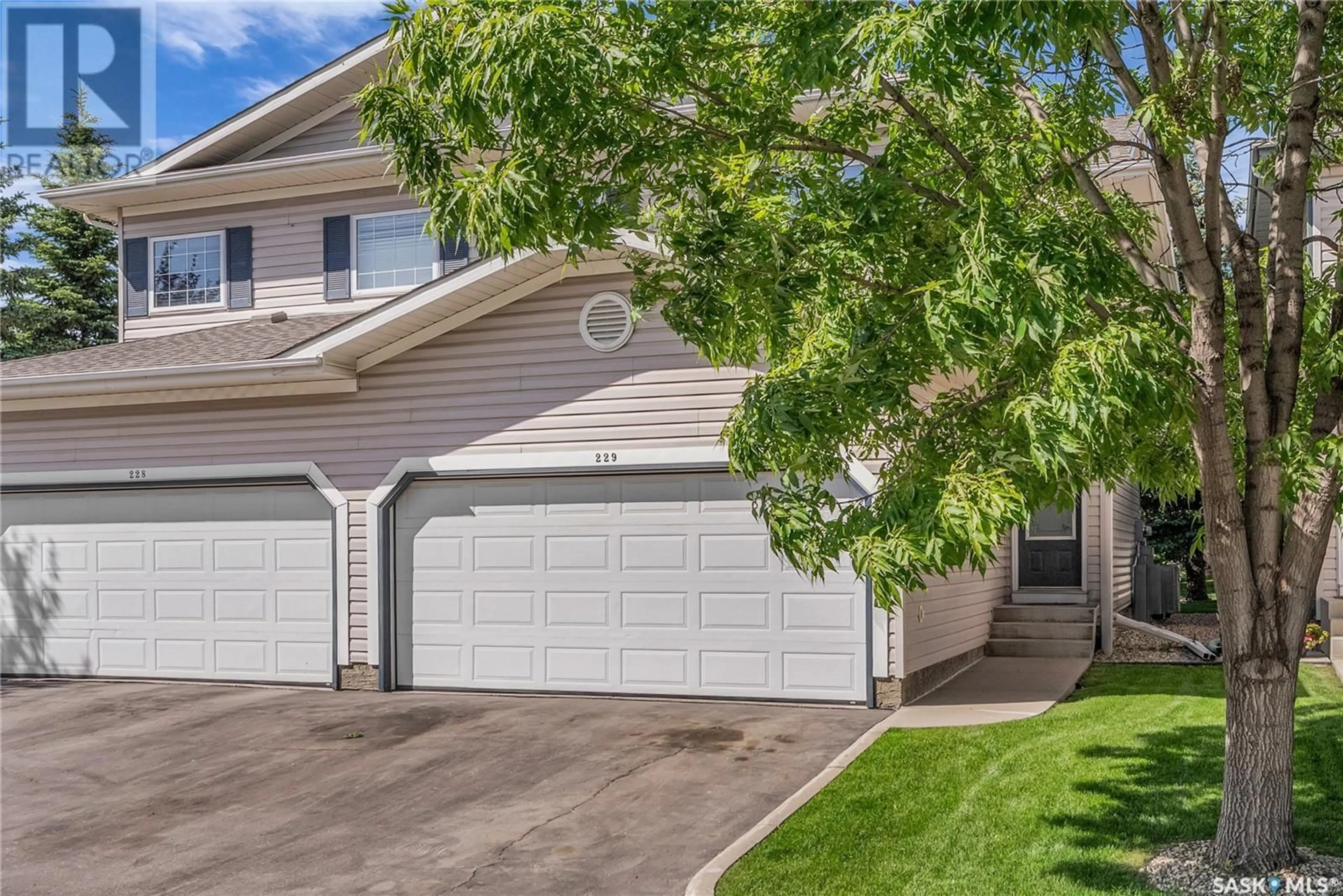 Home with vinyl exterior material, street for 615 - 229 KENDERDINE ROAD, Saskatoon Saskatchewan S7N4V1