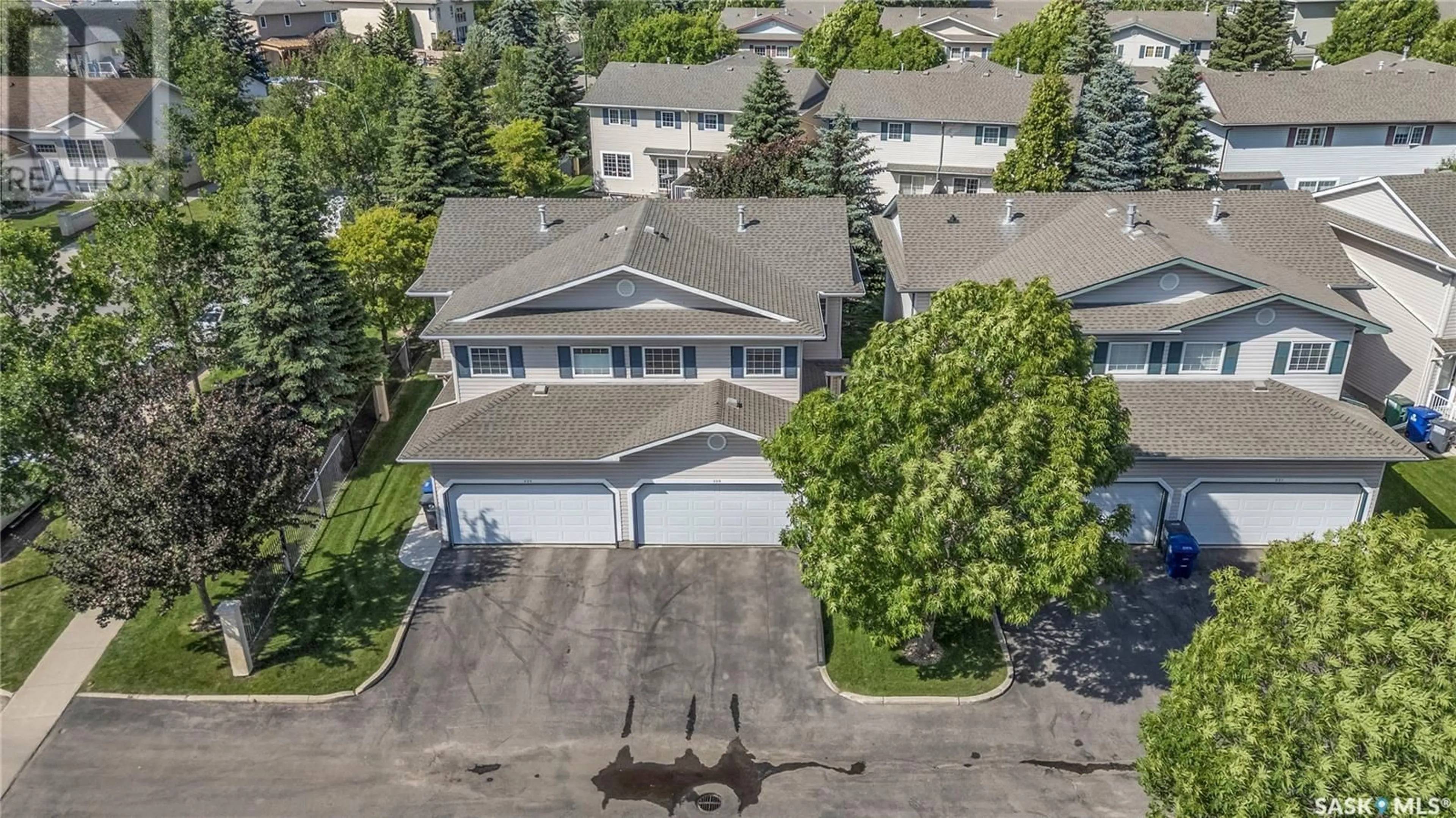 A pic from outside/outdoor area/front of a property/back of a property/a pic from drone, street for 615 - 229 KENDERDINE ROAD, Saskatoon Saskatchewan S7N4V1
