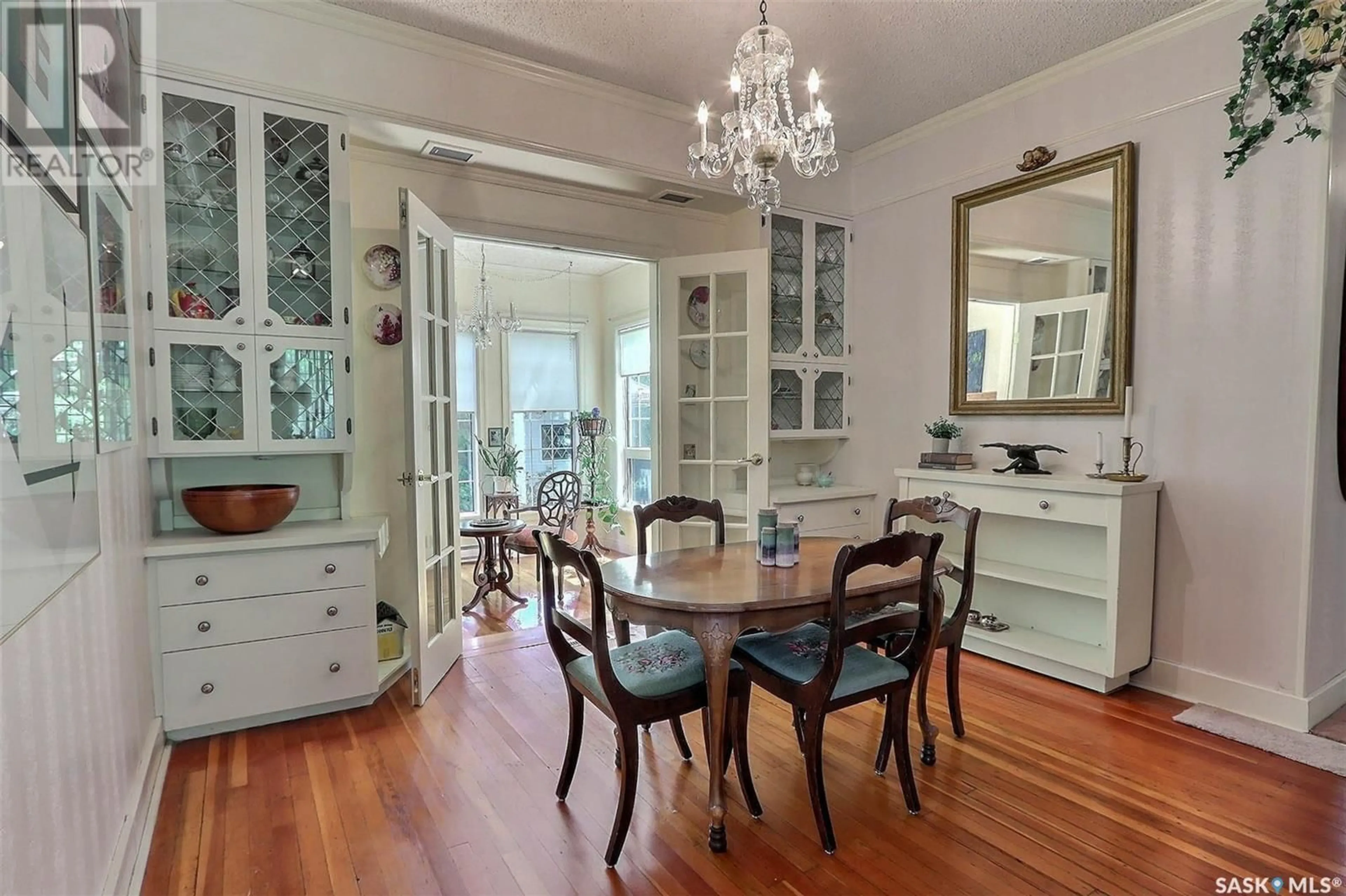 Dining room, wood/laminate floor for 2116 6TH AVENUE, Prince Albert Saskatchewan S6V5K6