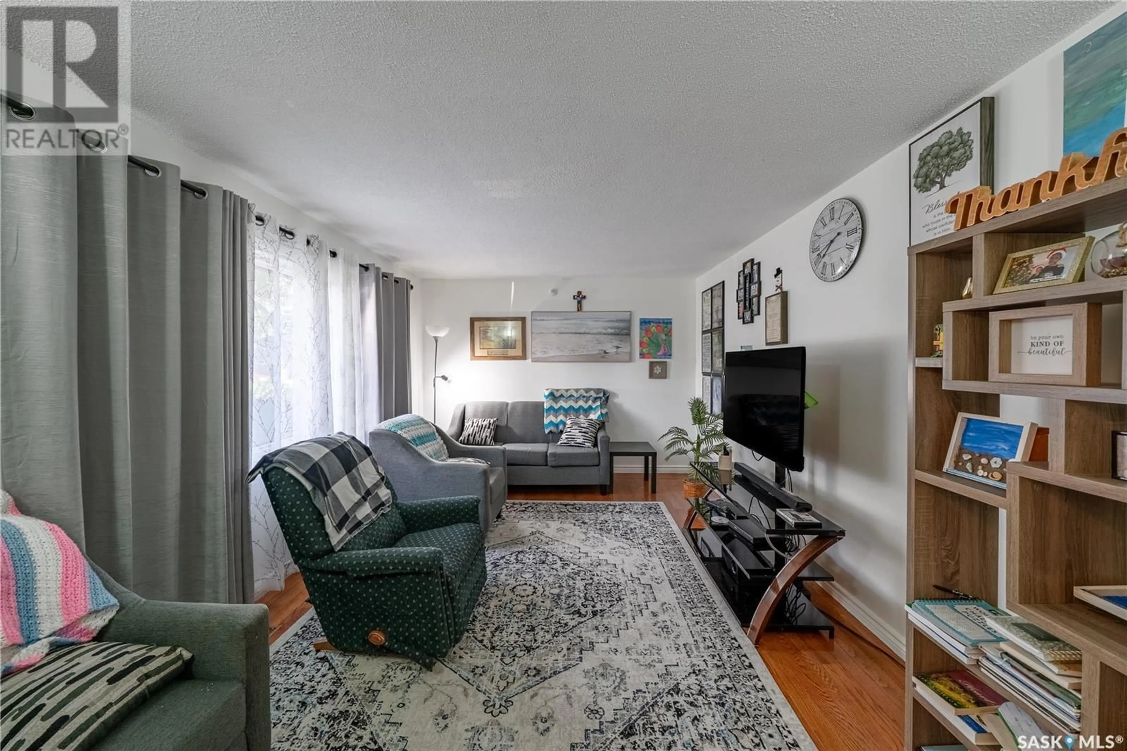 Living room with furniture, unknown for 301 MIKKELSON DRIVE, Regina Saskatchewan S4T6E1