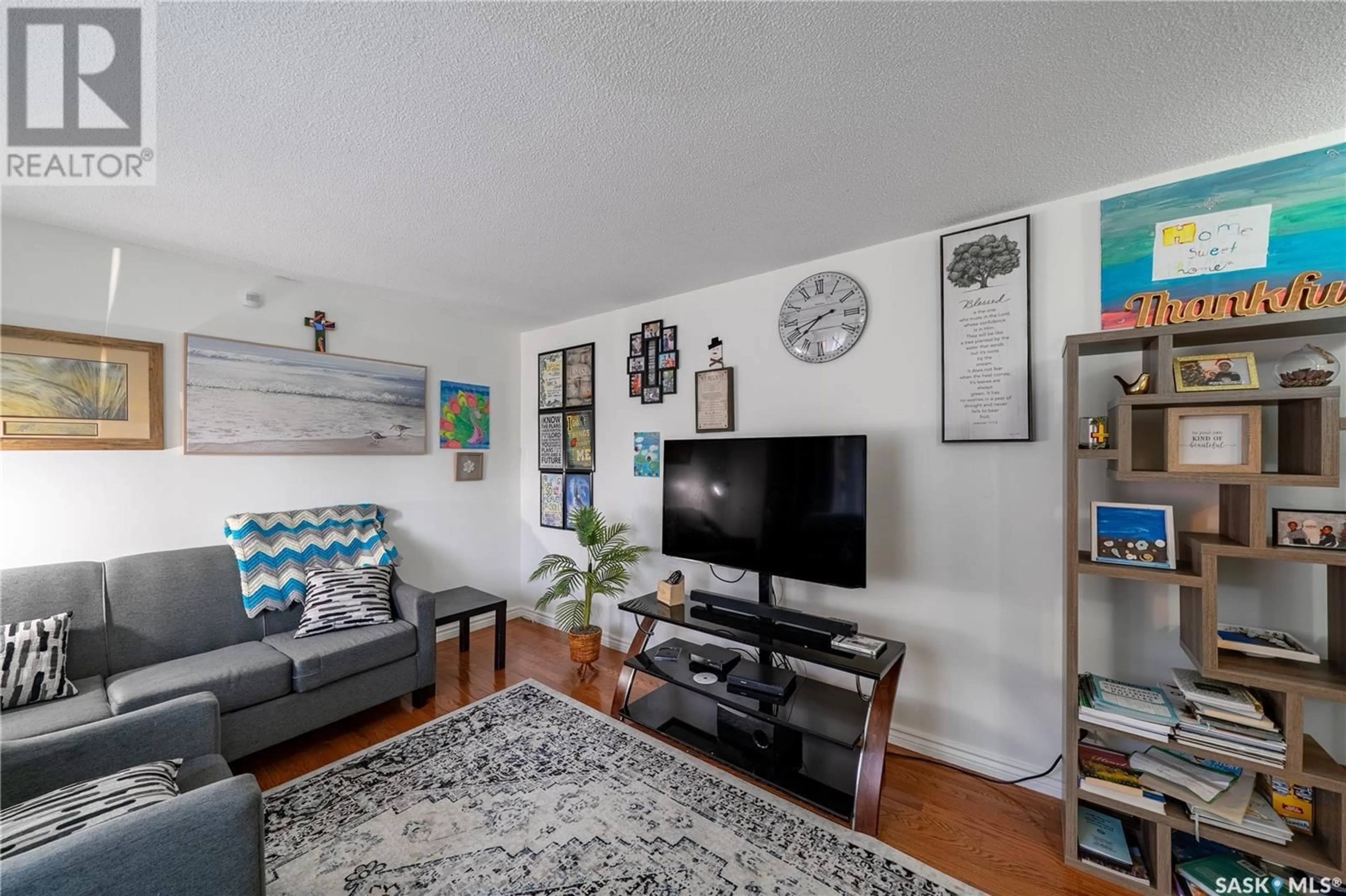 Living room with furniture, unknown for 301 MIKKELSON DRIVE, Regina Saskatchewan S4T6E1