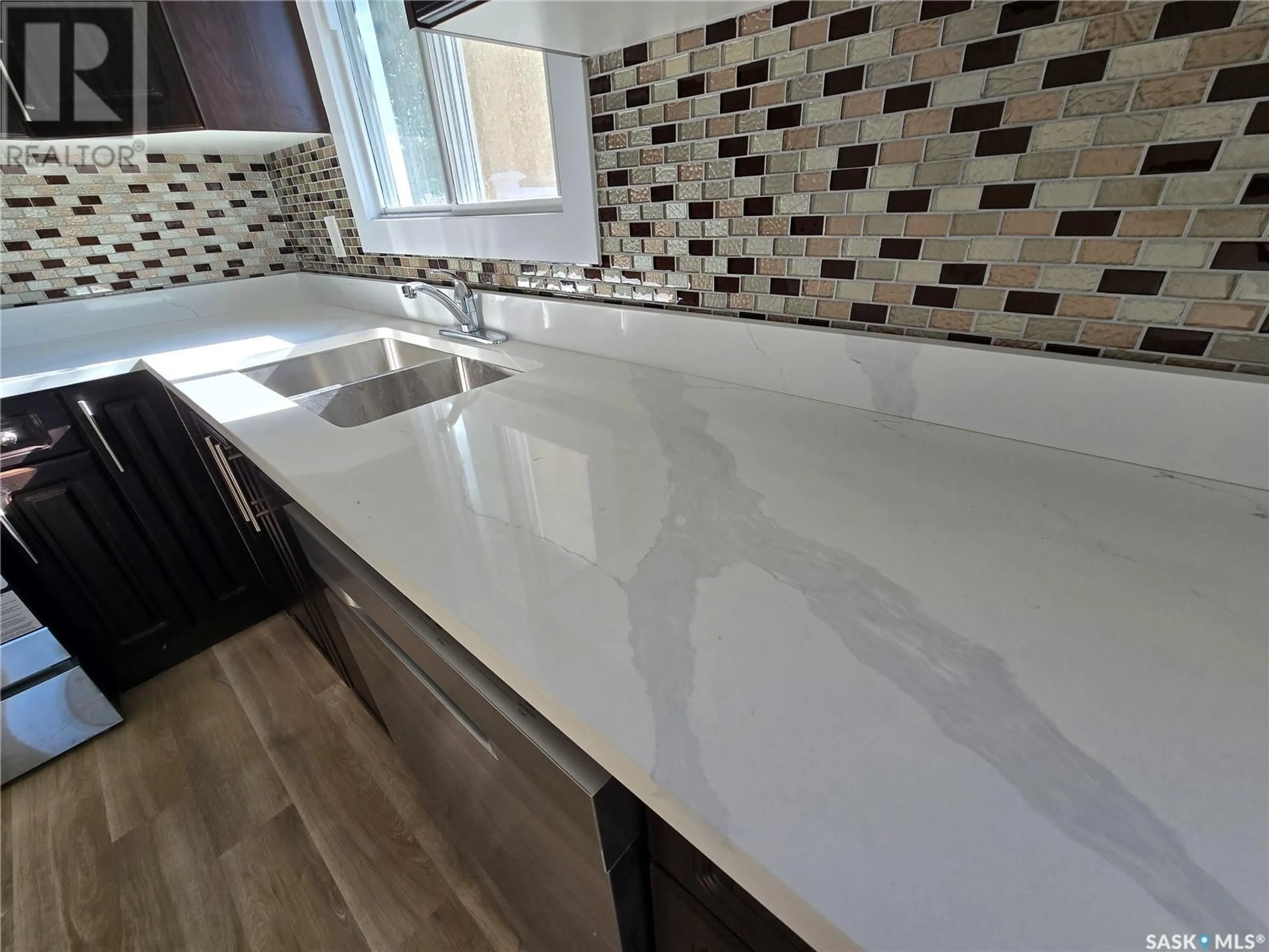Contemporary kitchen, ceramic/tile floor for 70 CARTIER CRESCENT, Saskatoon Saskatchewan S7L4L7