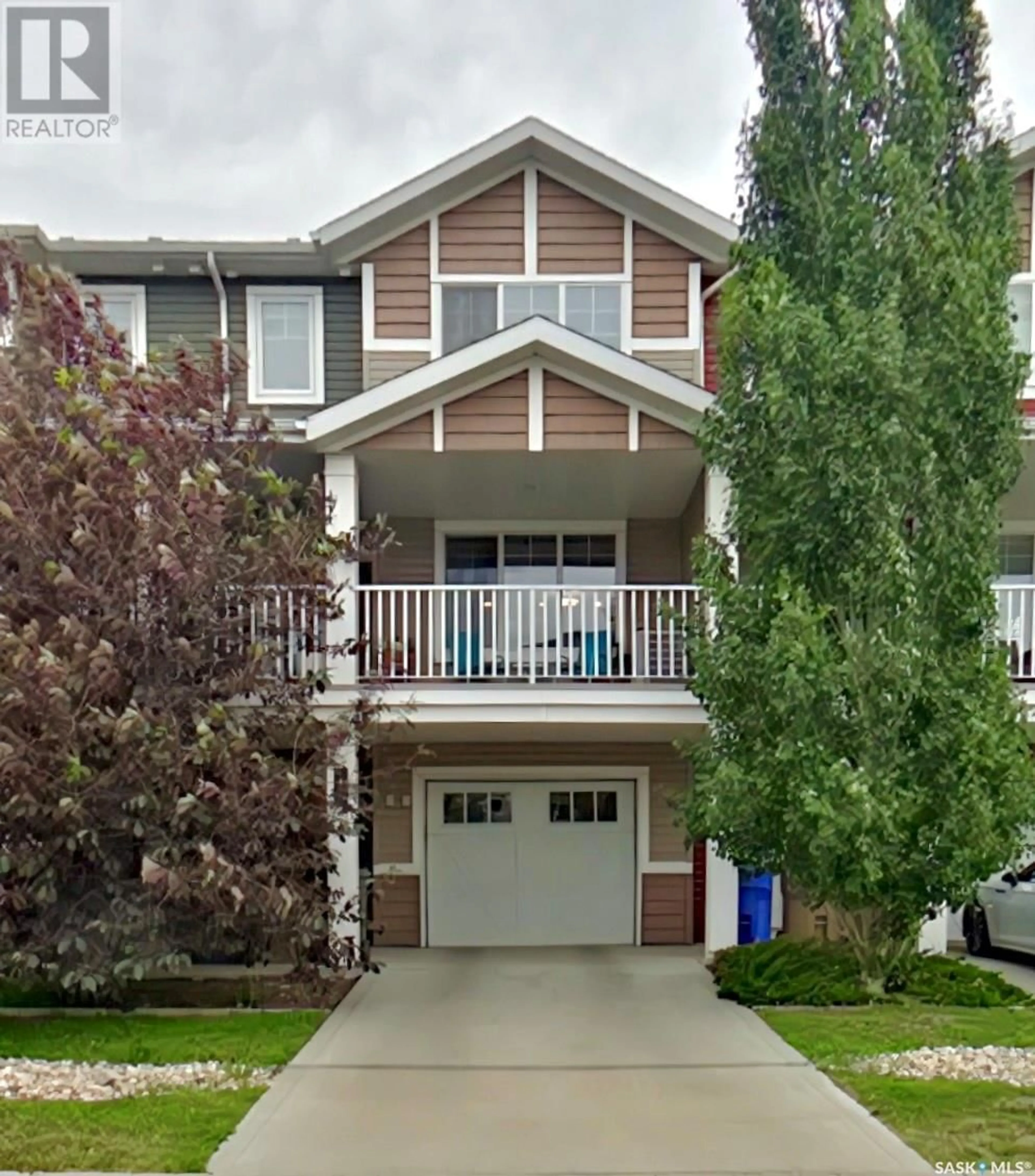 Home with vinyl exterior material, street for 4541 - 12 DELHAYE WAY, Regina Saskatchewan S4W0M2