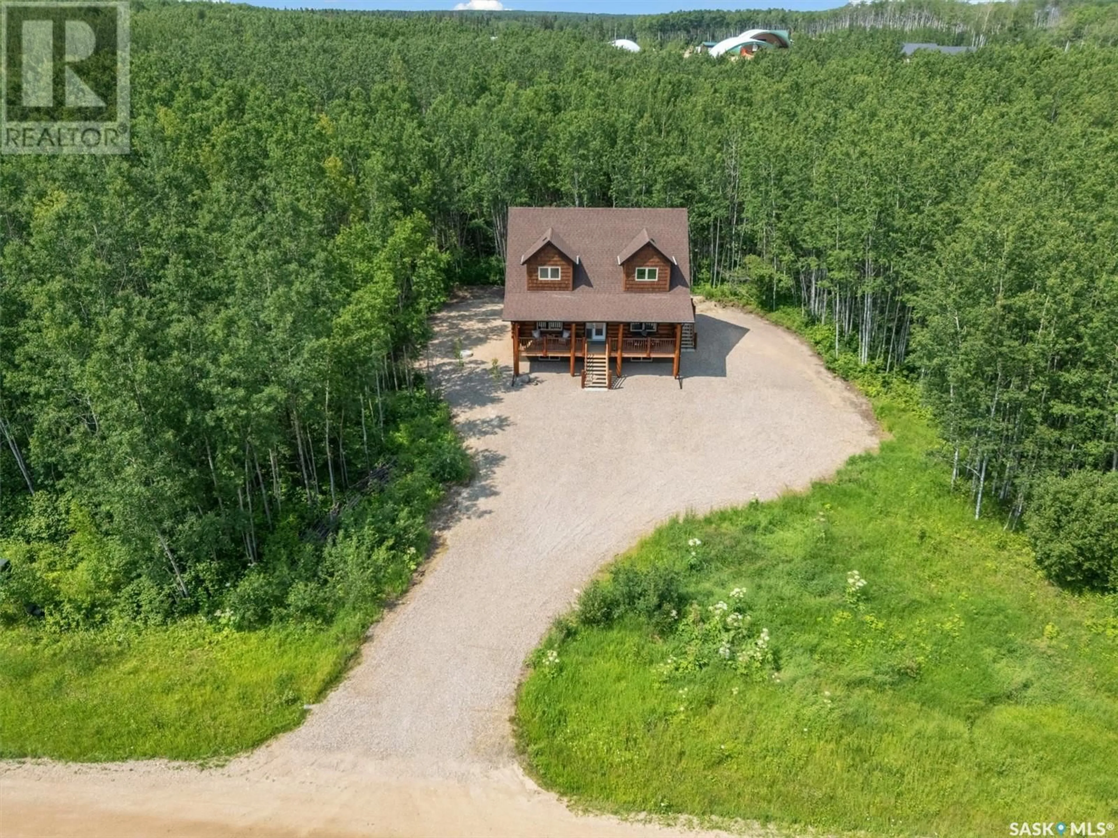 A pic from outside/outdoor area/front of a property/back of a property/a pic from drone, unknown for 214 DEER RIDGE DRIVE, Lakeland Rm No. 521 Saskatchewan S0J0N0
