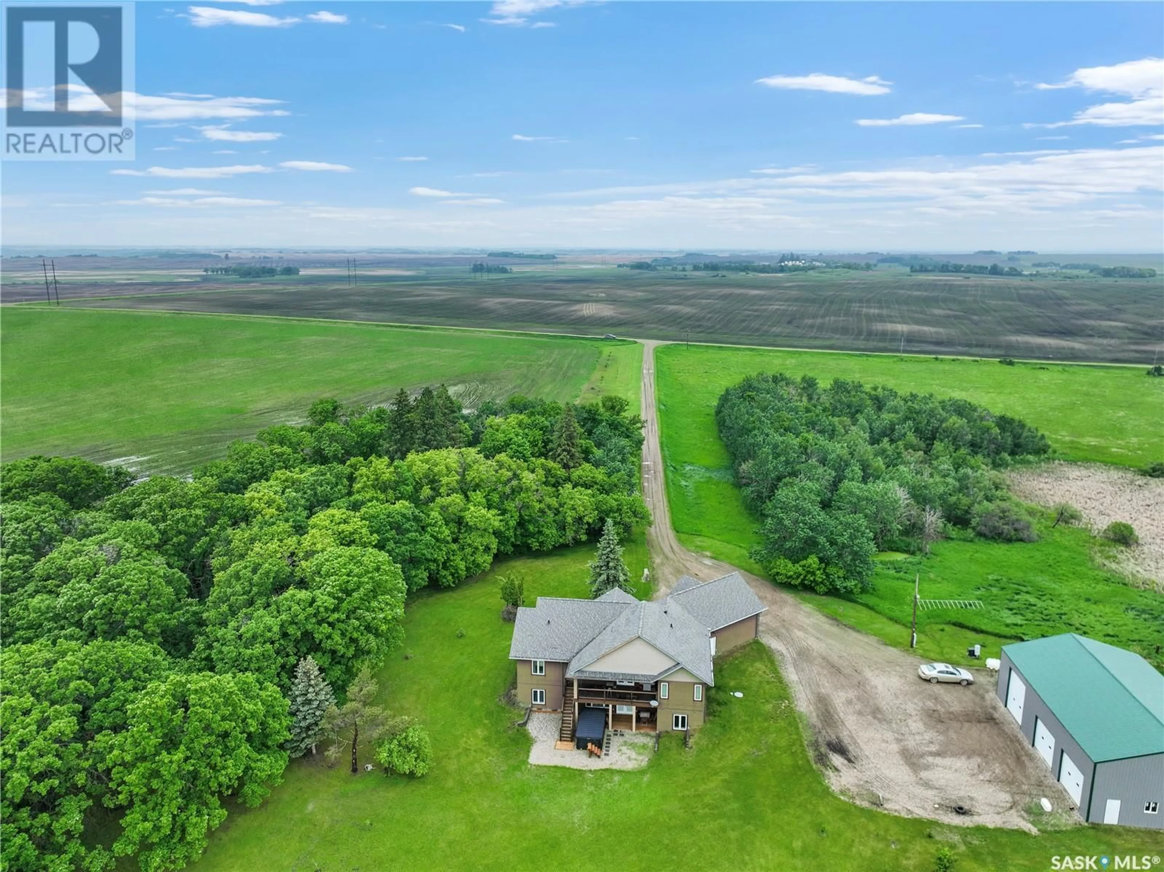 A pic from outside/outdoor area/front of a property/back of a property/a pic from drone, water/lake/river/ocean view for HOLARS HAVEN ACREAGE, Spy Hill Rm No. 152 Saskatchewan S0A4B0