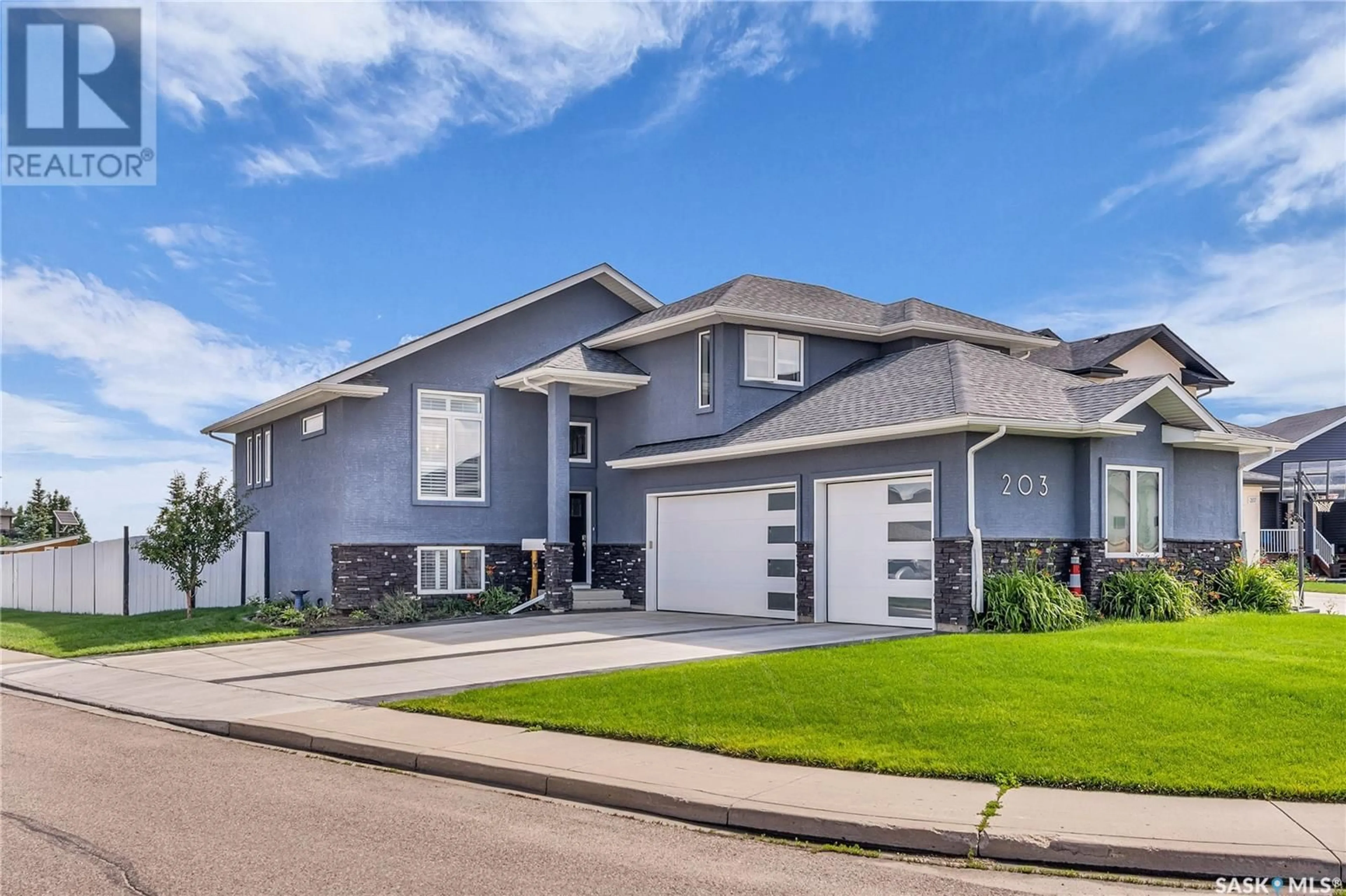 Home with vinyl exterior material, street for 203 LEHRER PLACE, Saskatoon Saskatchewan S7R0L4