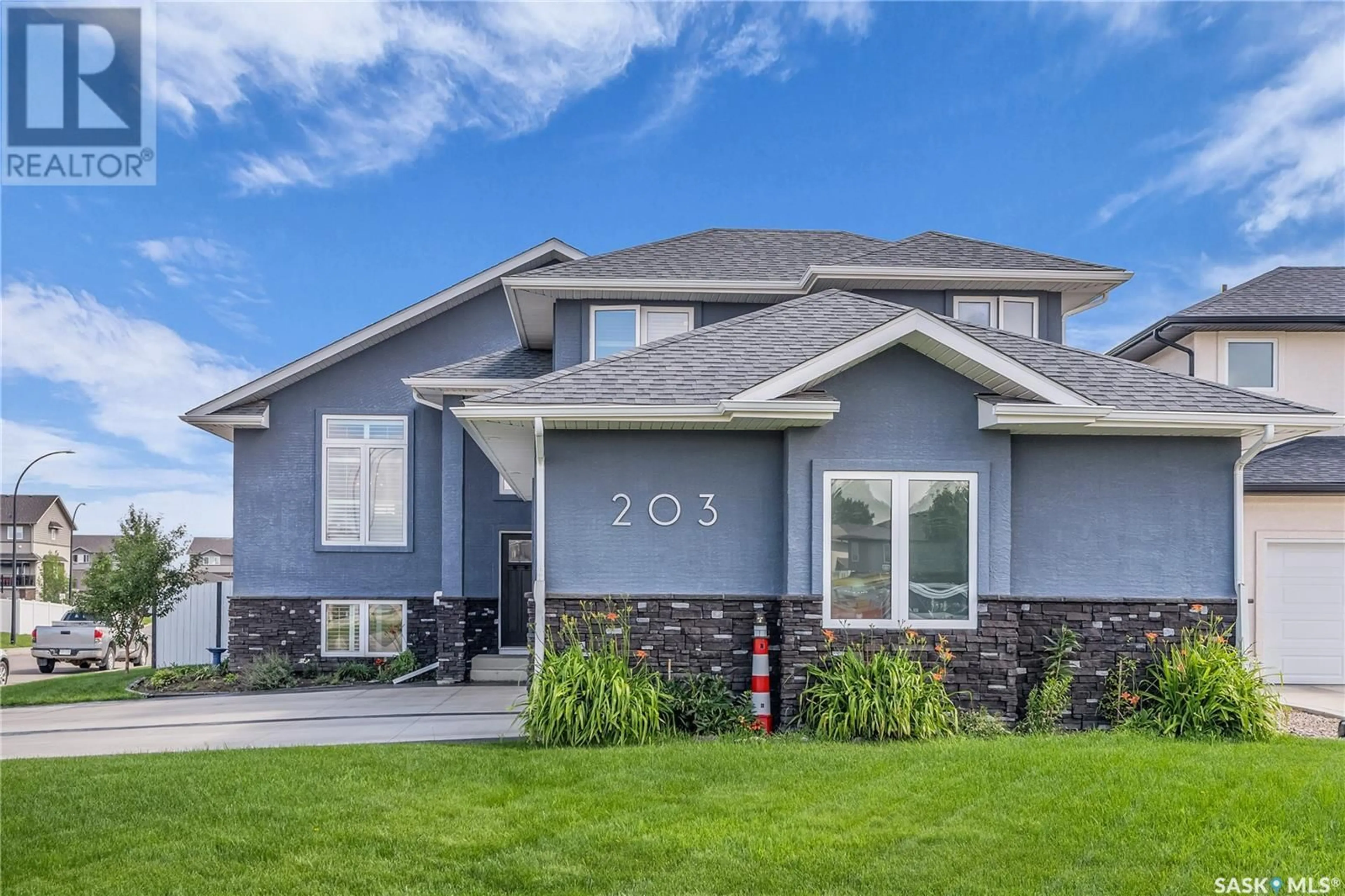 Home with vinyl exterior material, street for 203 LEHRER PLACE, Saskatoon Saskatchewan S7R0L4