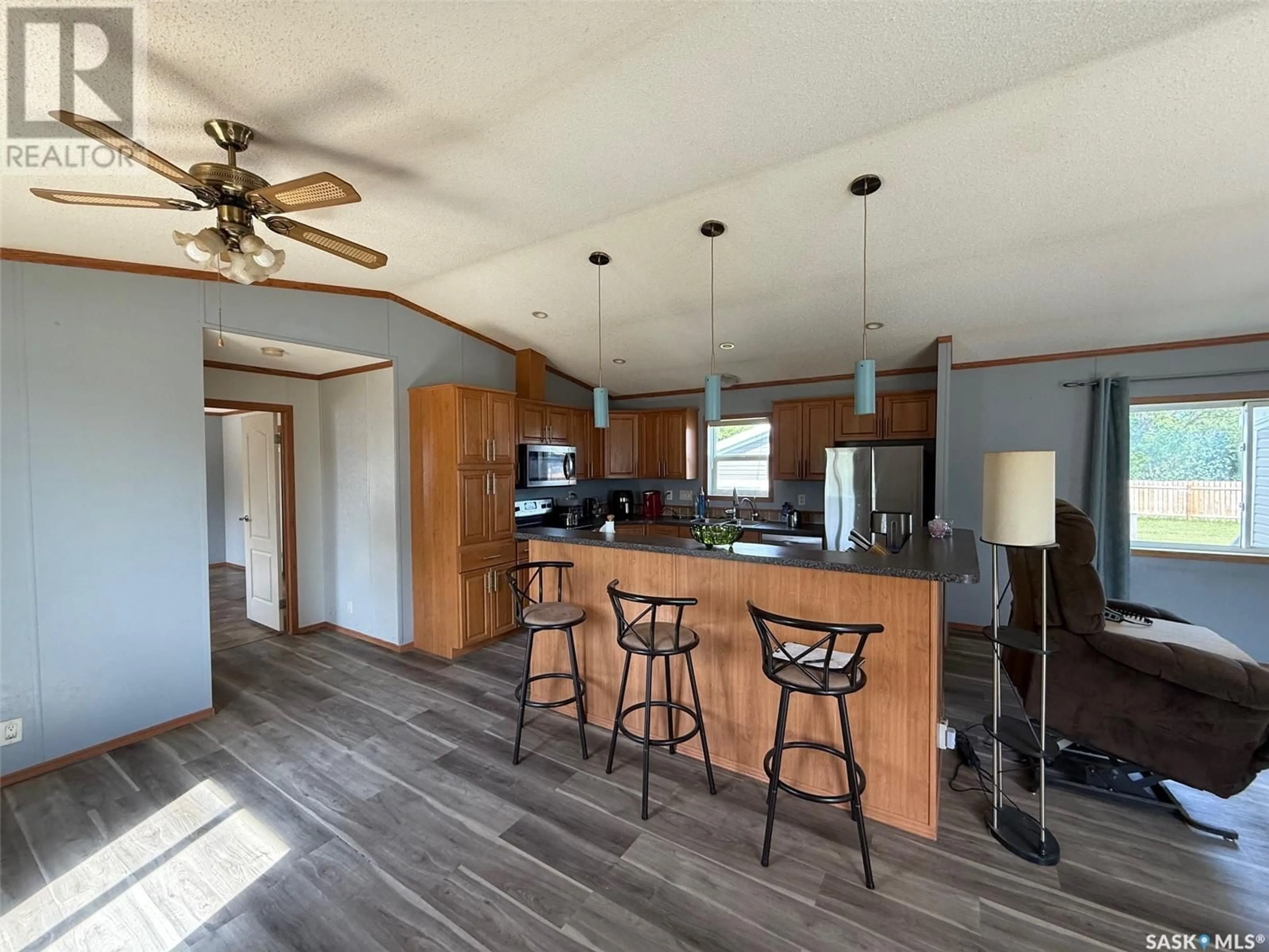 Open concept kitchen, wood/laminate floor for 708 MAIN STREET, Maymont Saskatchewan S0M1T0