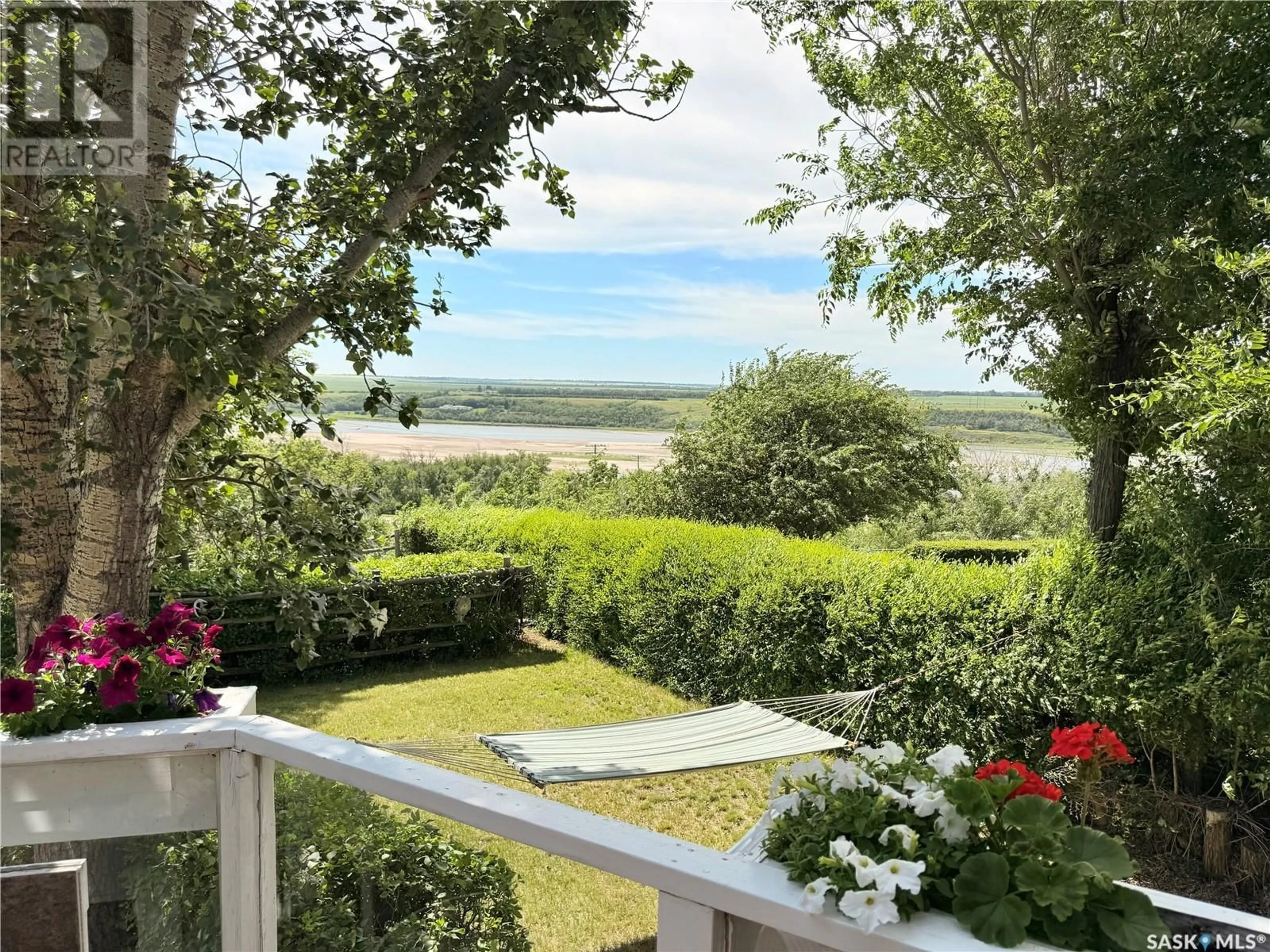 A pic from outside/outdoor area/front of a property/back of a property/a pic from drone, water/lake/river/ocean view for 51 TUFTS CRESCENT, Outlook Saskatchewan S0L2N0