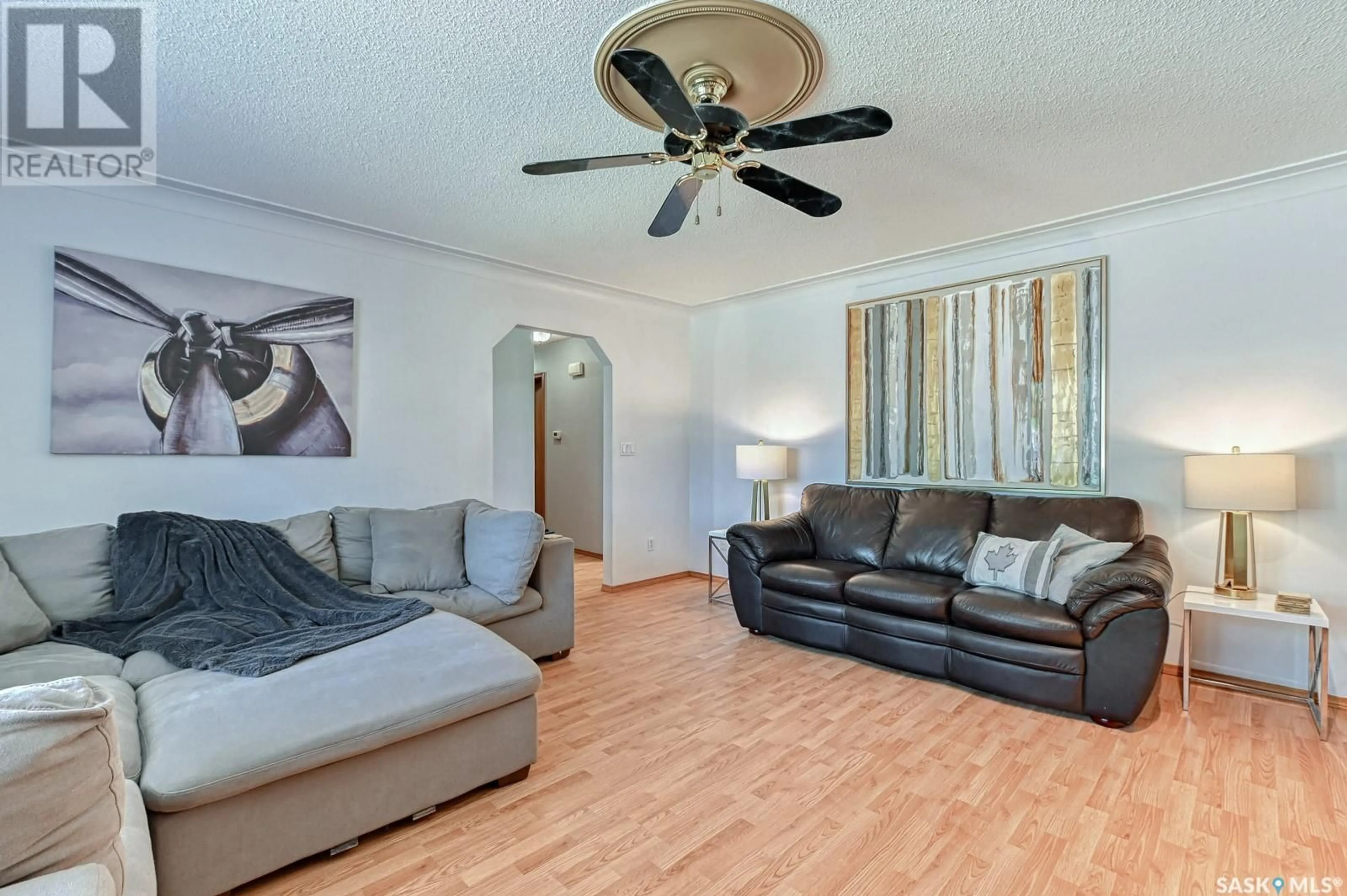 Living room with furniture, wood/laminate floor for 282 FROOM CRESCENT, Regina Saskatchewan S4N1B7