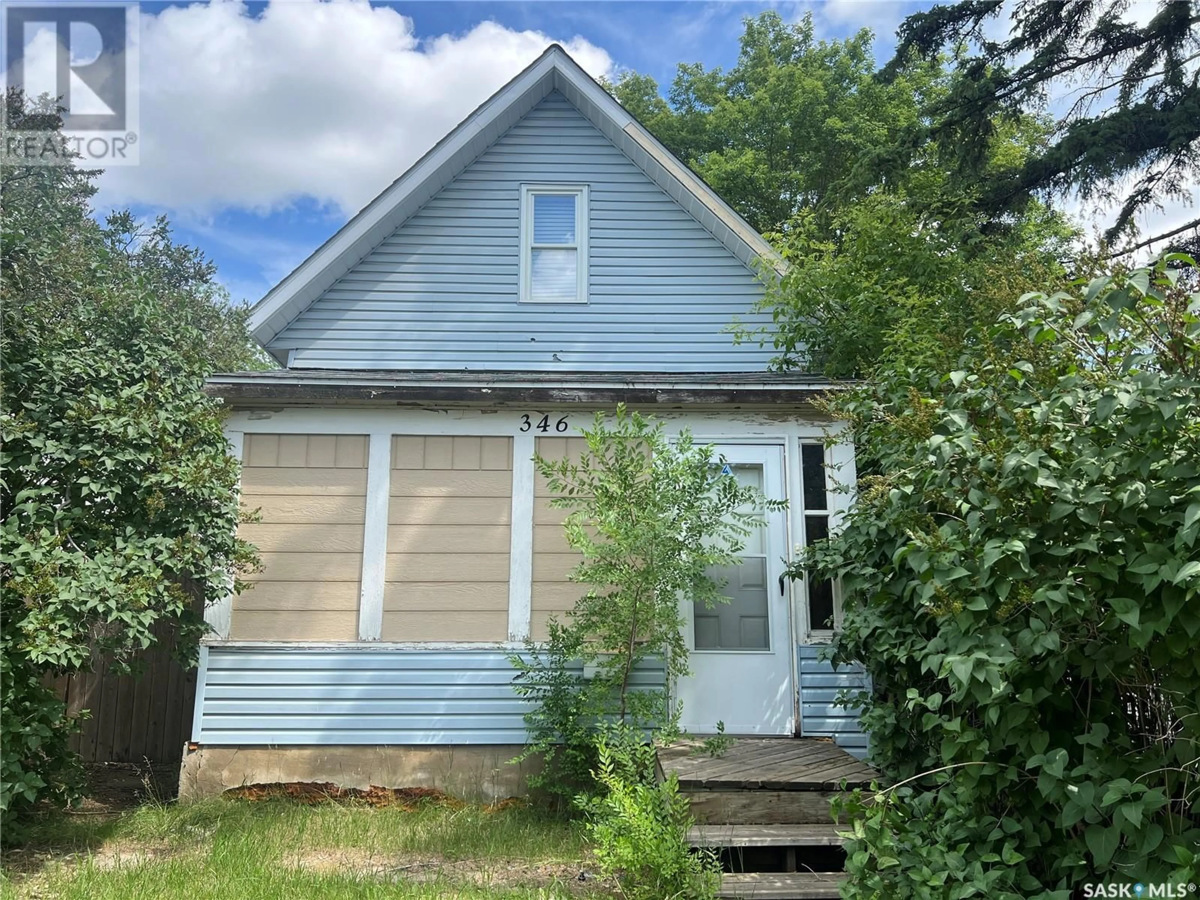 Home with vinyl exterior material, street for 346 R AVENUE, Saskatoon Saskatchewan S7M2Z3