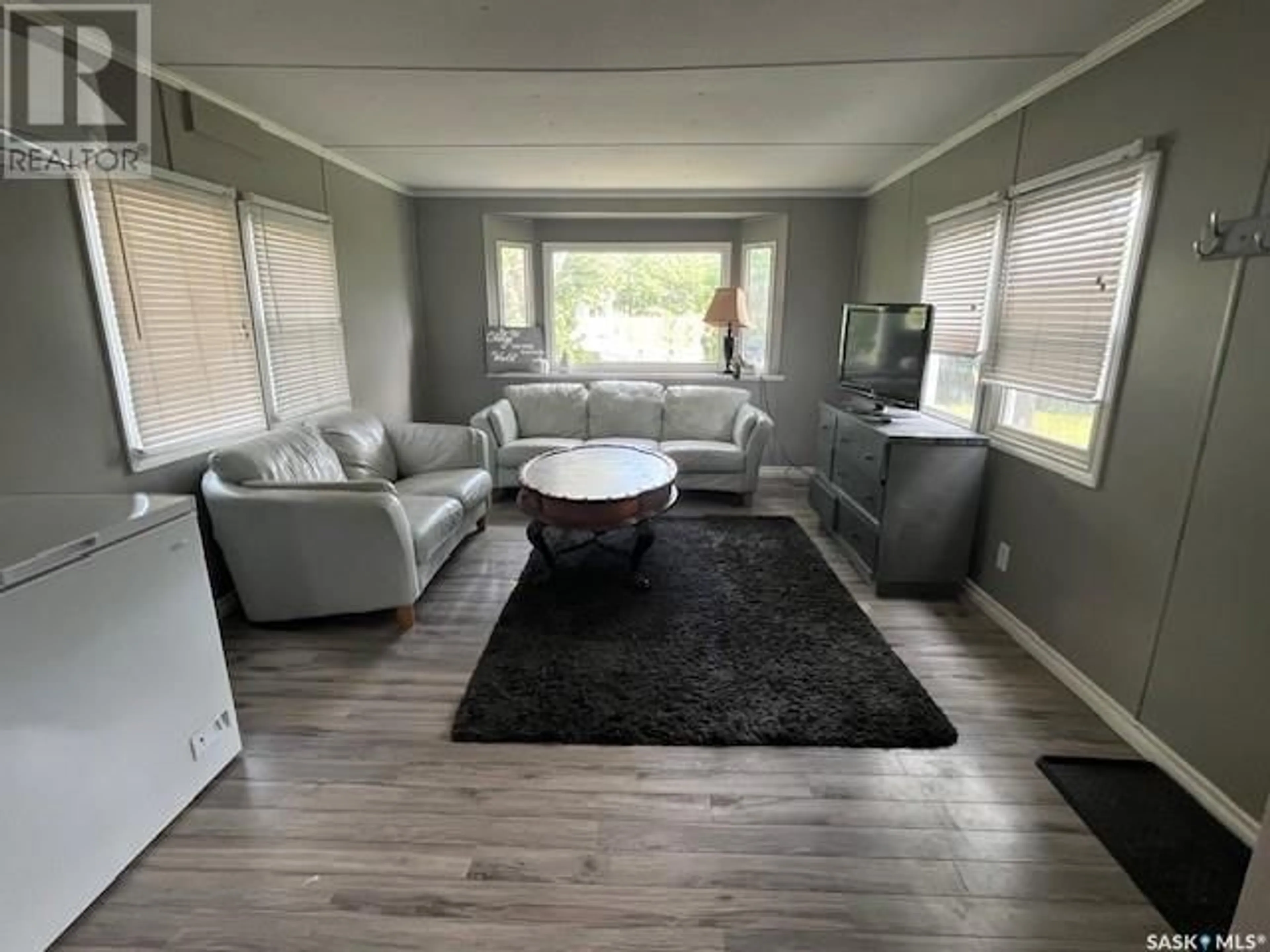 Living room with furniture, unknown for 126 DOGWOOD STREET, Caronport Saskatchewan S0H0S0