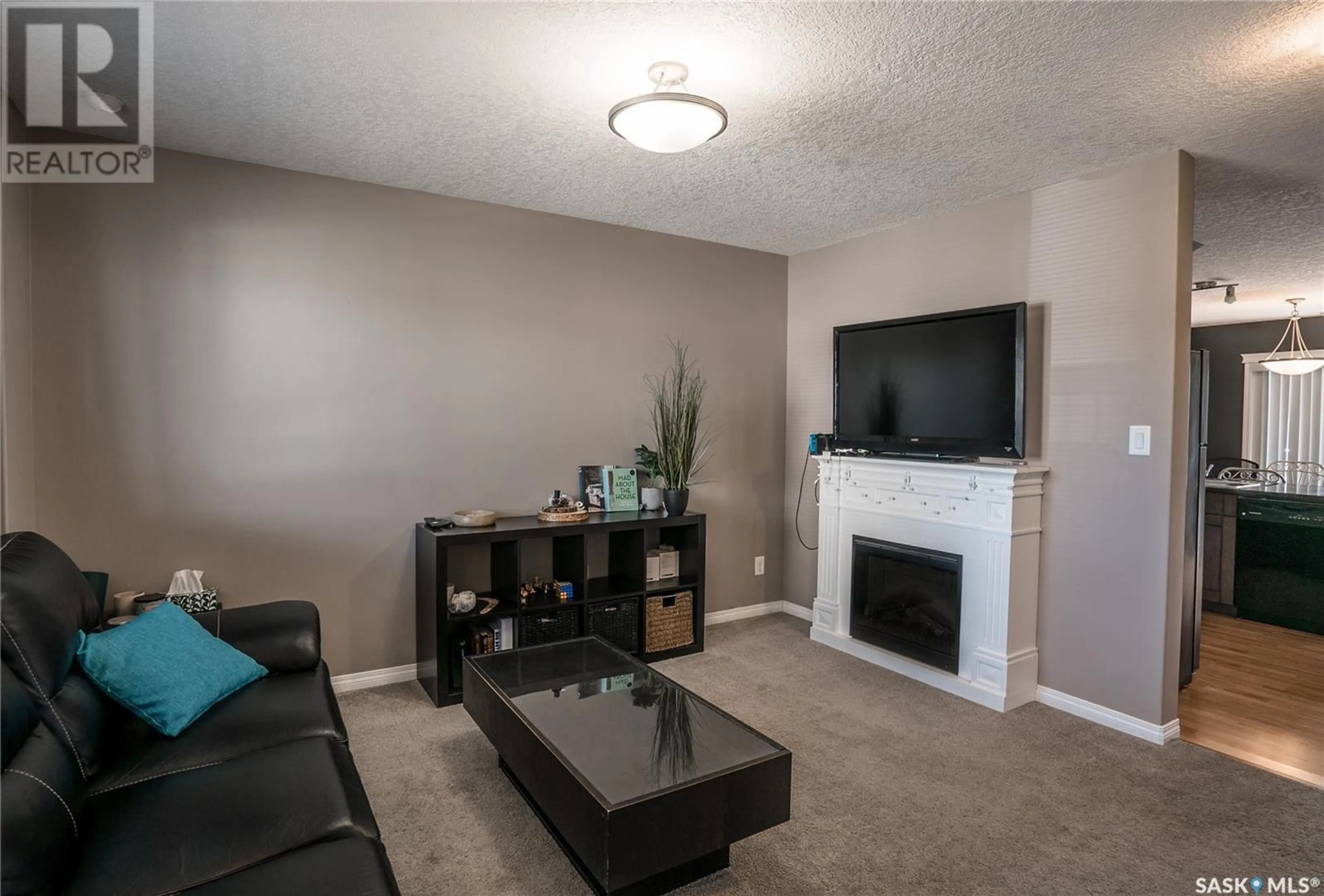 Living room with furniture, unknown for 103 - 411 KLASSEN CRESCENT, Saskatoon Saskatchewan S7R0J2