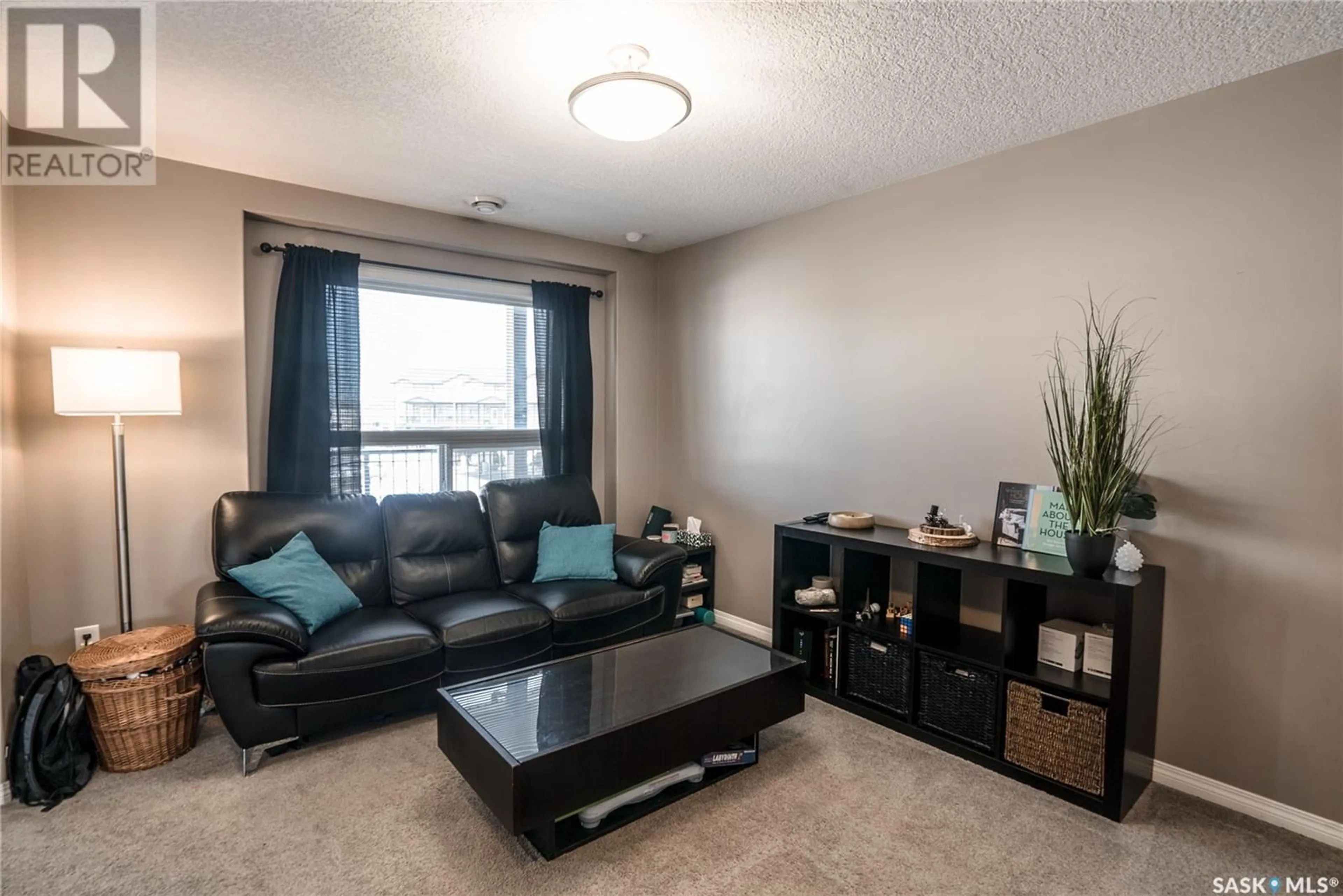 Living room with furniture, unknown for 103 - 411 KLASSEN CRESCENT, Saskatoon Saskatchewan S7R0J2