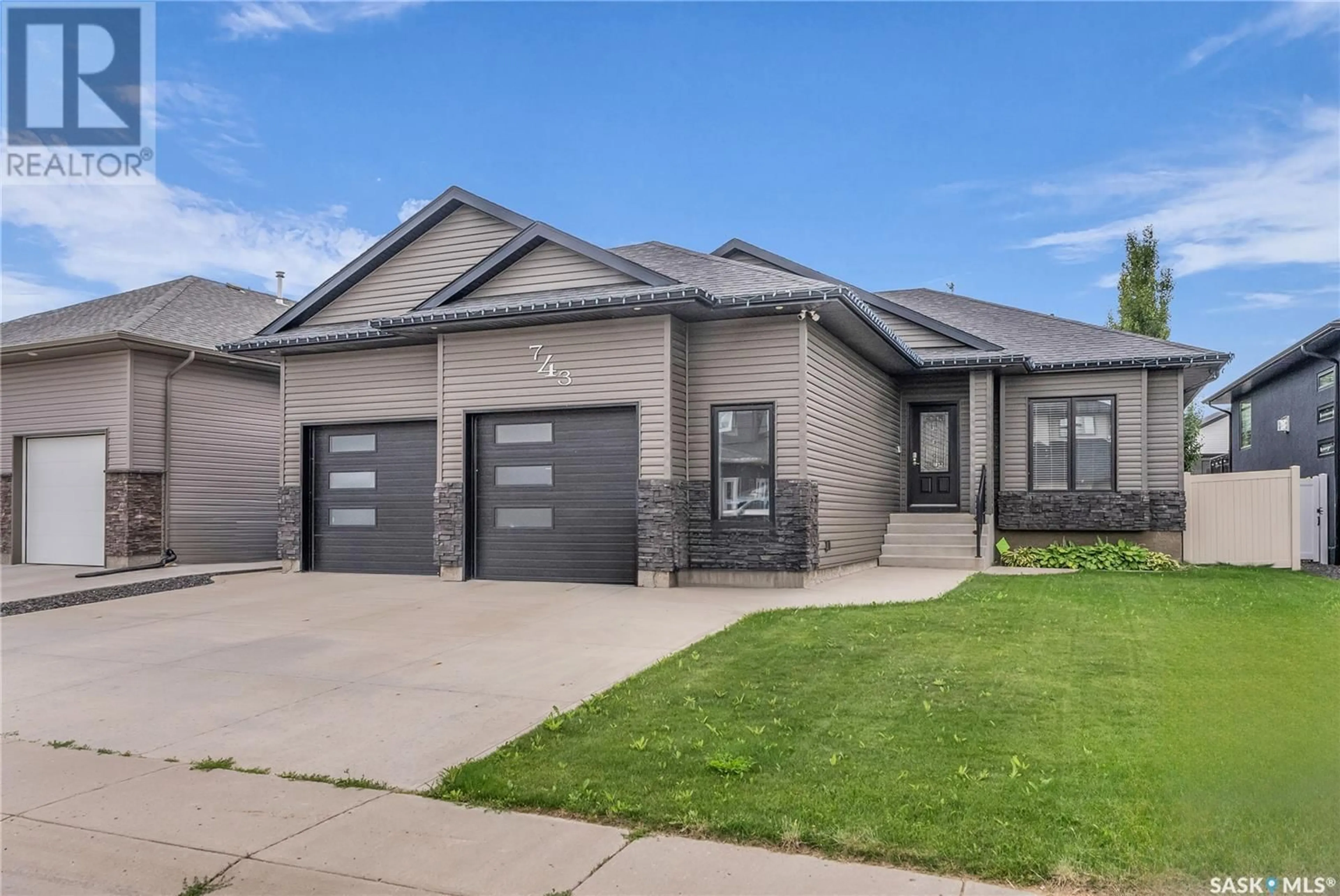 Home with brick exterior material, street for 743 KLOPPENBURG COURT, Saskatoon Saskatchewan S7W0P2