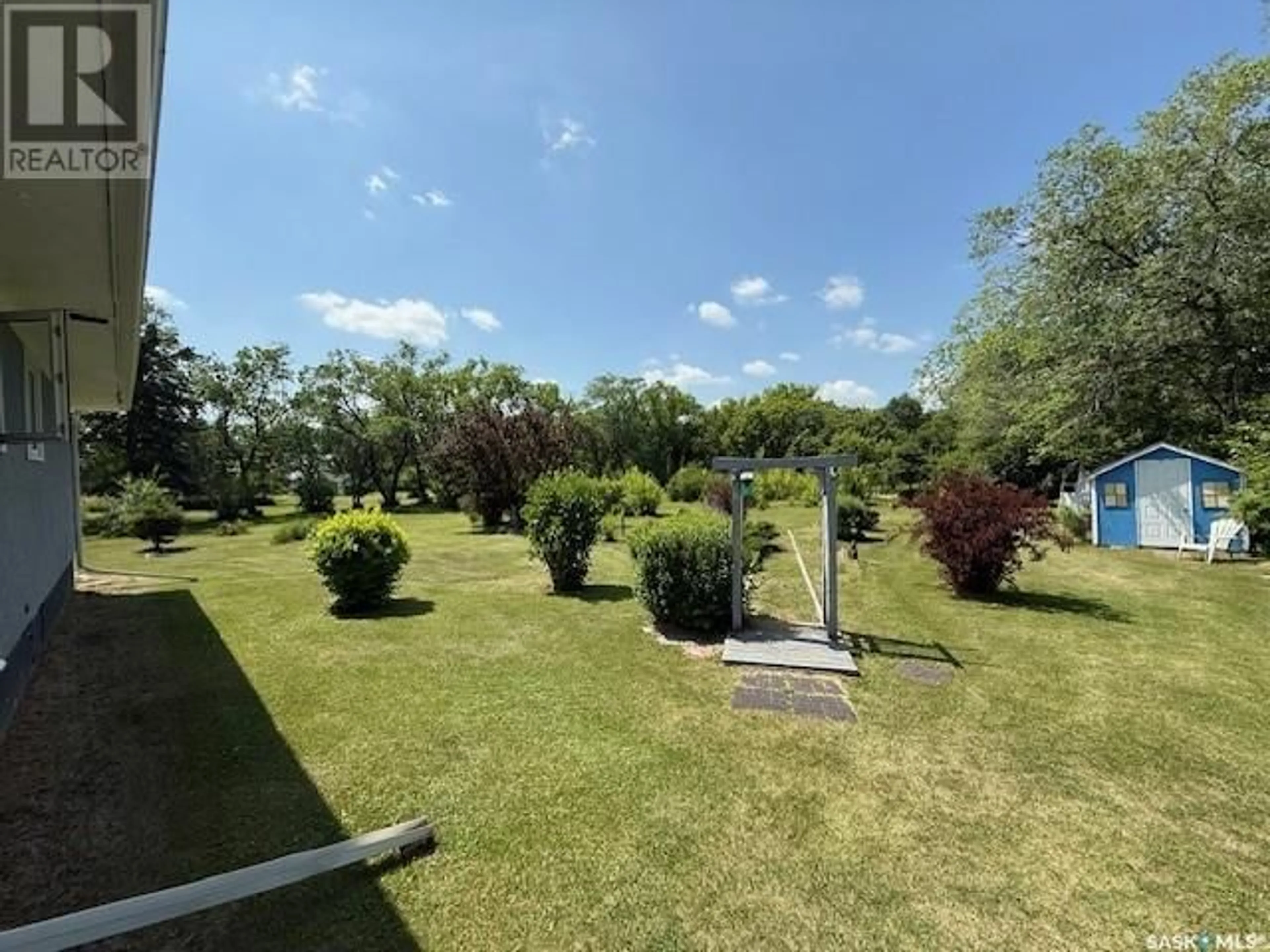 A pic from outside/outdoor area/front of a property/back of a property/a pic from drone, unknown for 169 ROAD ALLOWANCE, Calder Saskatchewan S0A0K0
