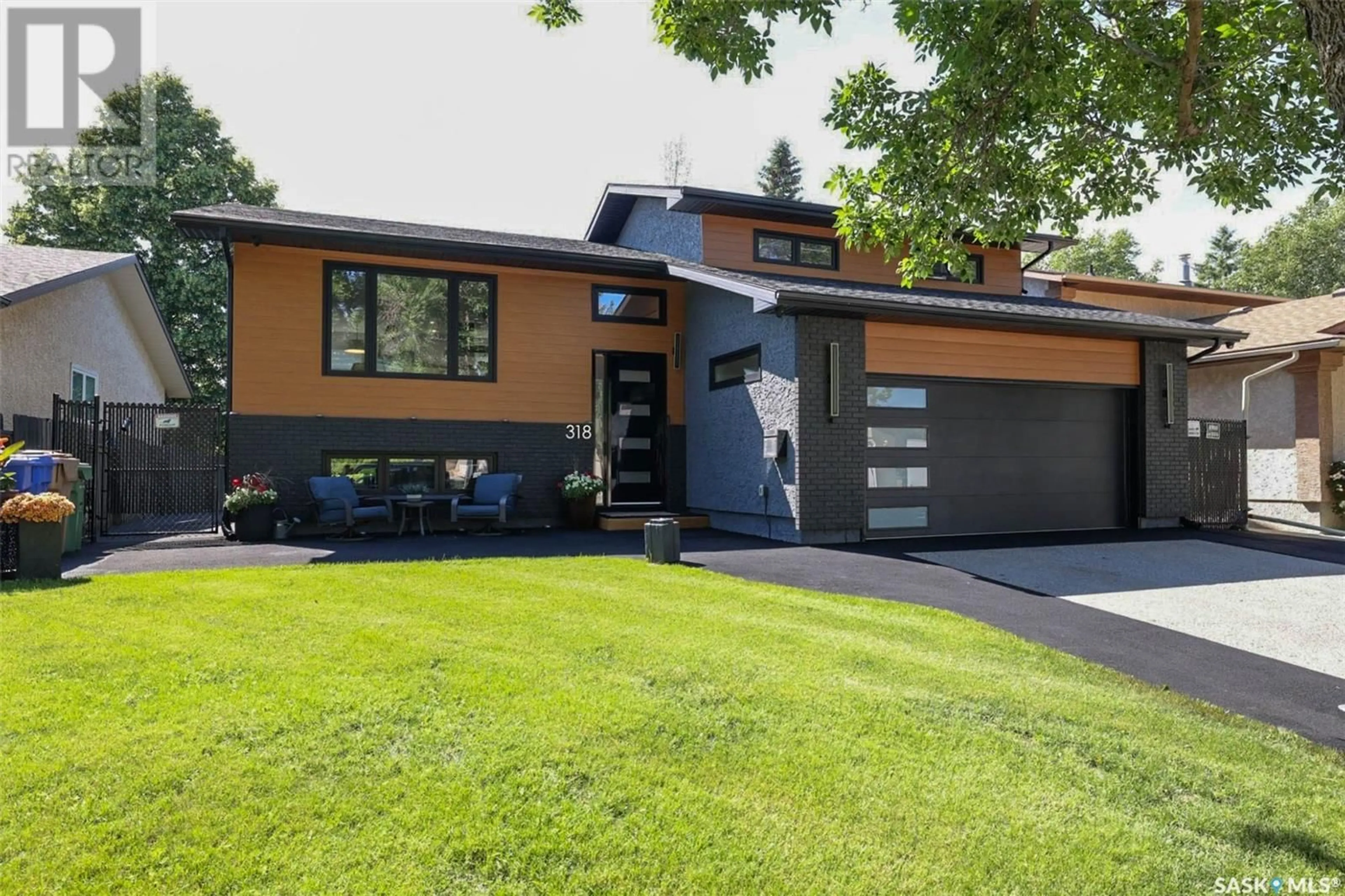 Home with brick exterior material, street for 318 BLACK DRIVE, Regina Saskatchewan S4X2V3