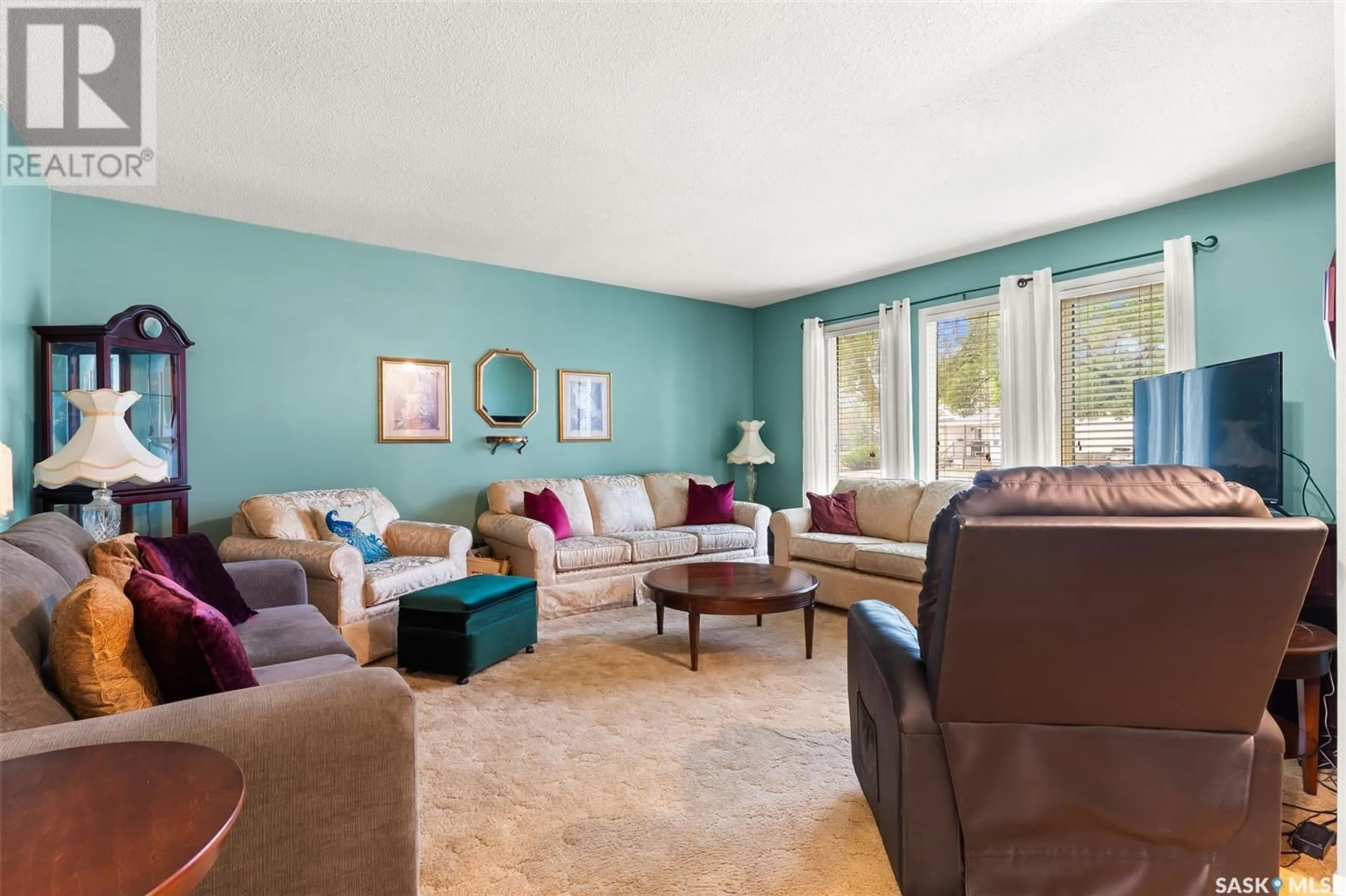 Living room with furniture, unknown for 14 HAMMOND ROAD, Regina Saskatchewan S4R3C6