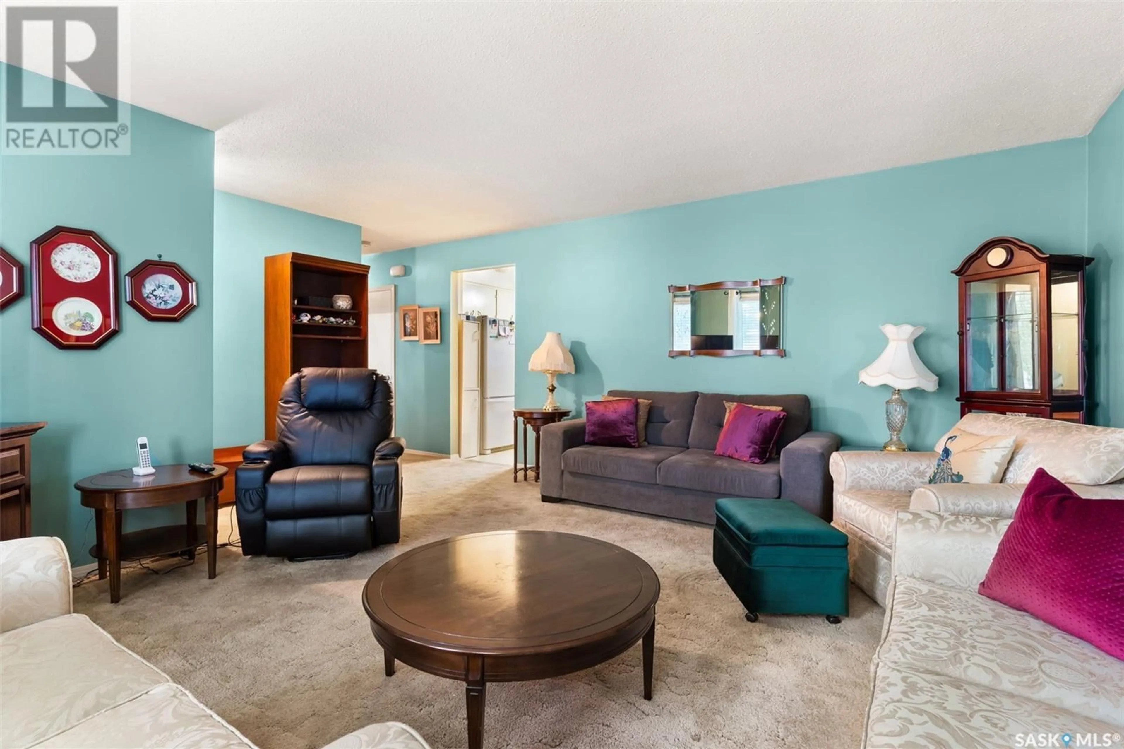 Living room with furniture, unknown for 14 HAMMOND ROAD, Regina Saskatchewan S4R3C6