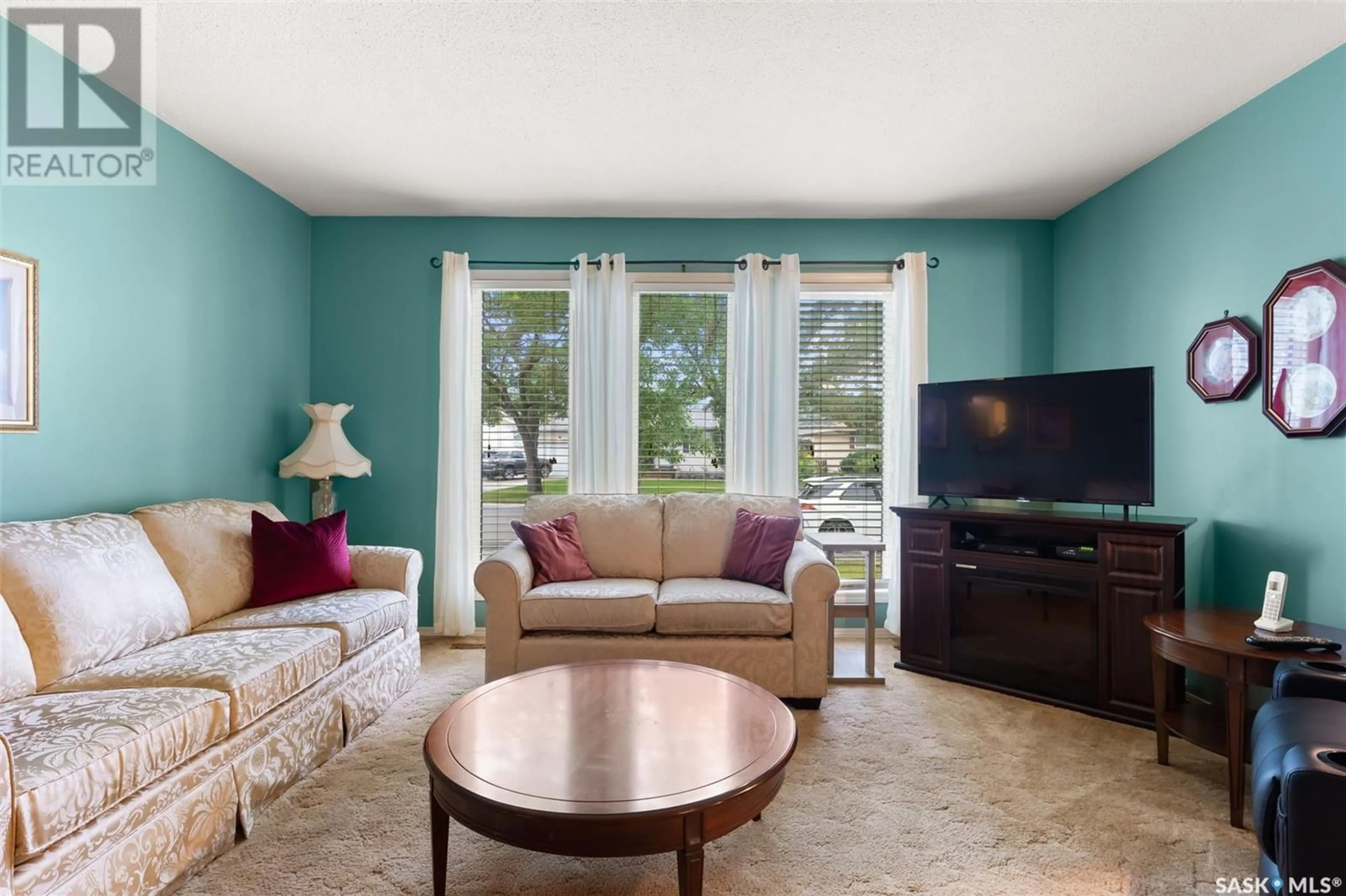 Living room with furniture, unknown for 14 HAMMOND ROAD, Regina Saskatchewan S4R3C6