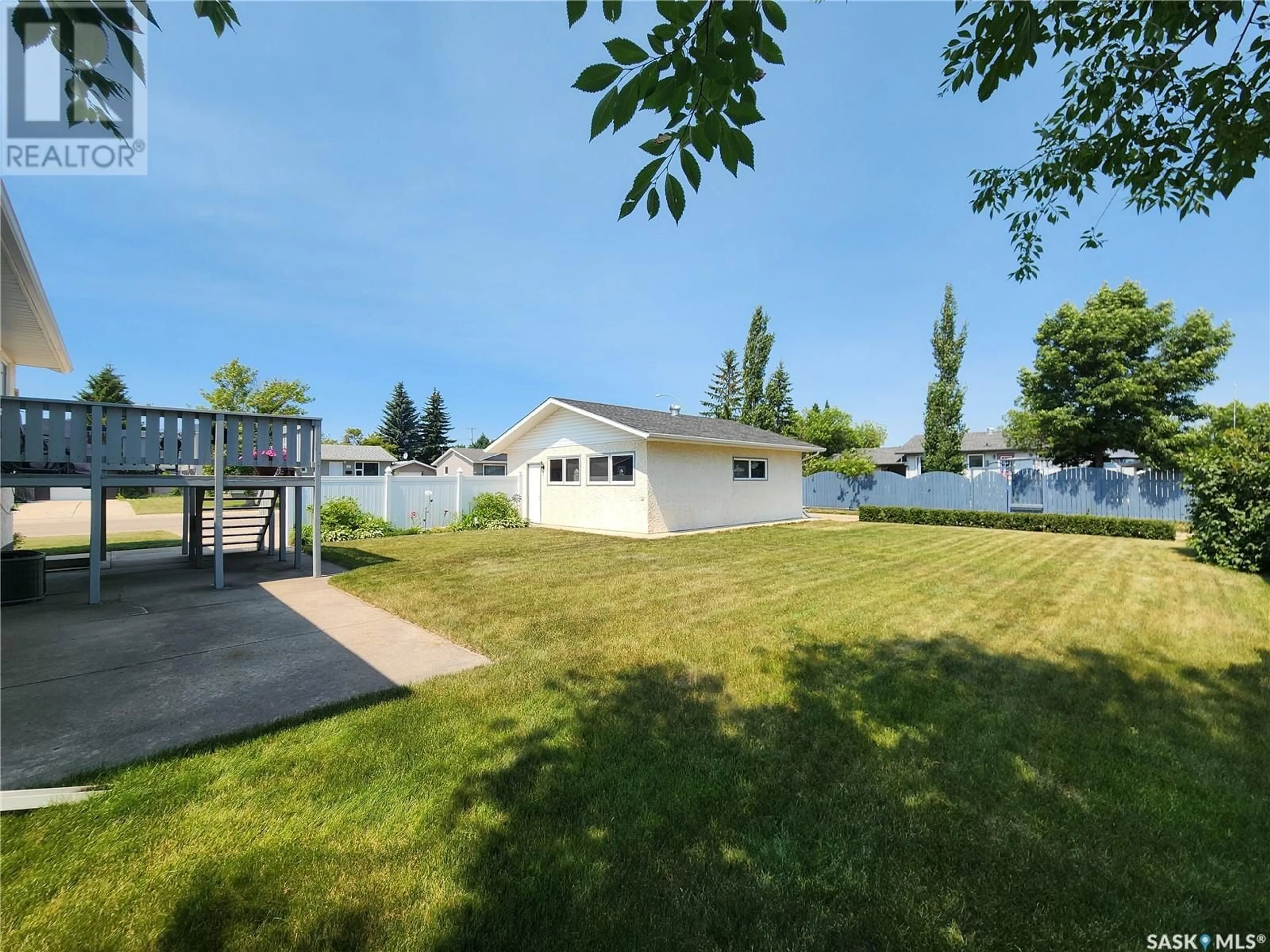 A pic from outside/outdoor area/front of a property/back of a property/a pic from drone, water/lake/river/ocean view for 1 CENTENNIAL CRESCENT, Melville Saskatchewan S0A2P0