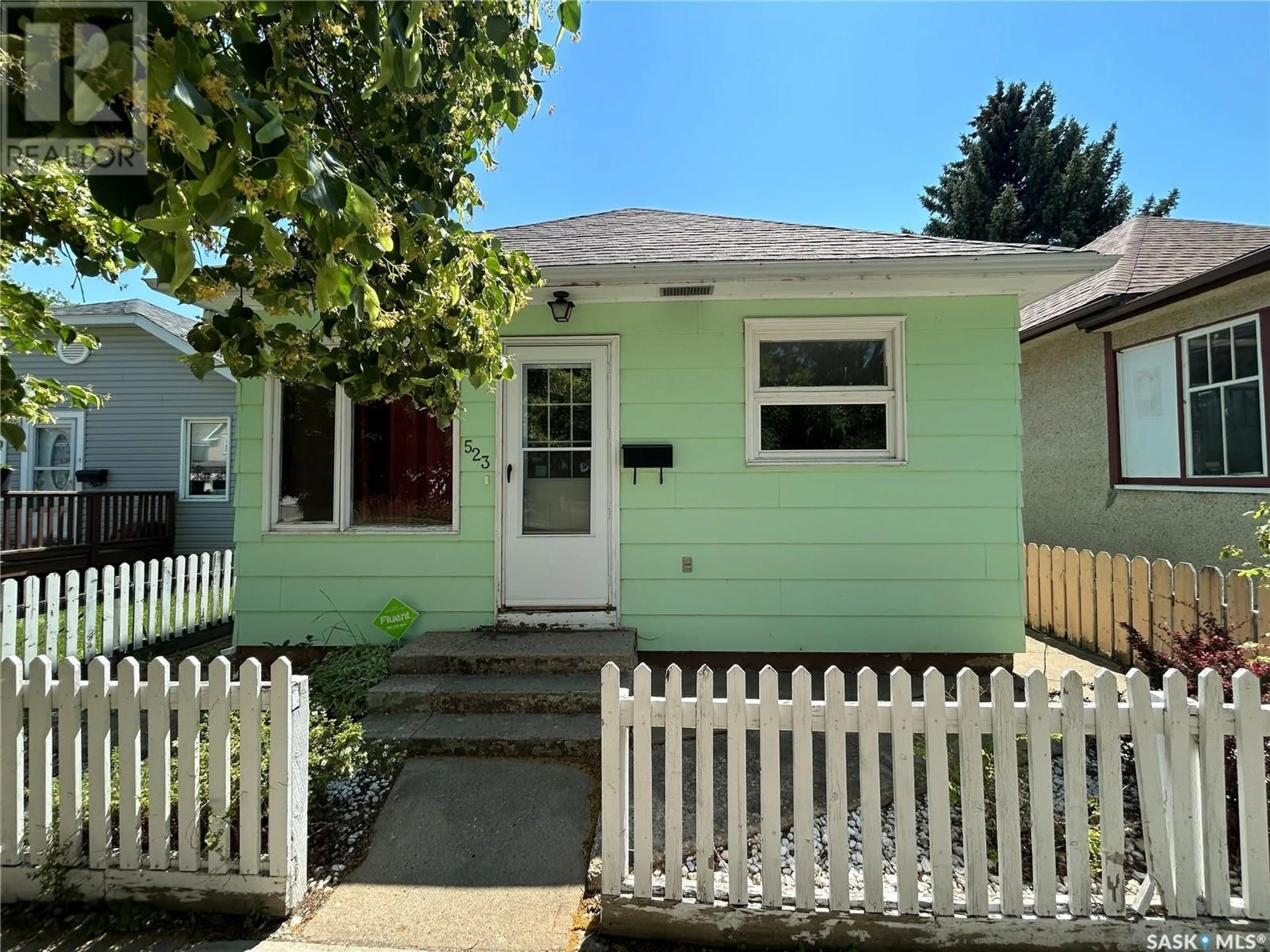 Home with vinyl exterior material, street for 523 OMINICA STREET, Moose Jaw Saskatchewan S6H0H2