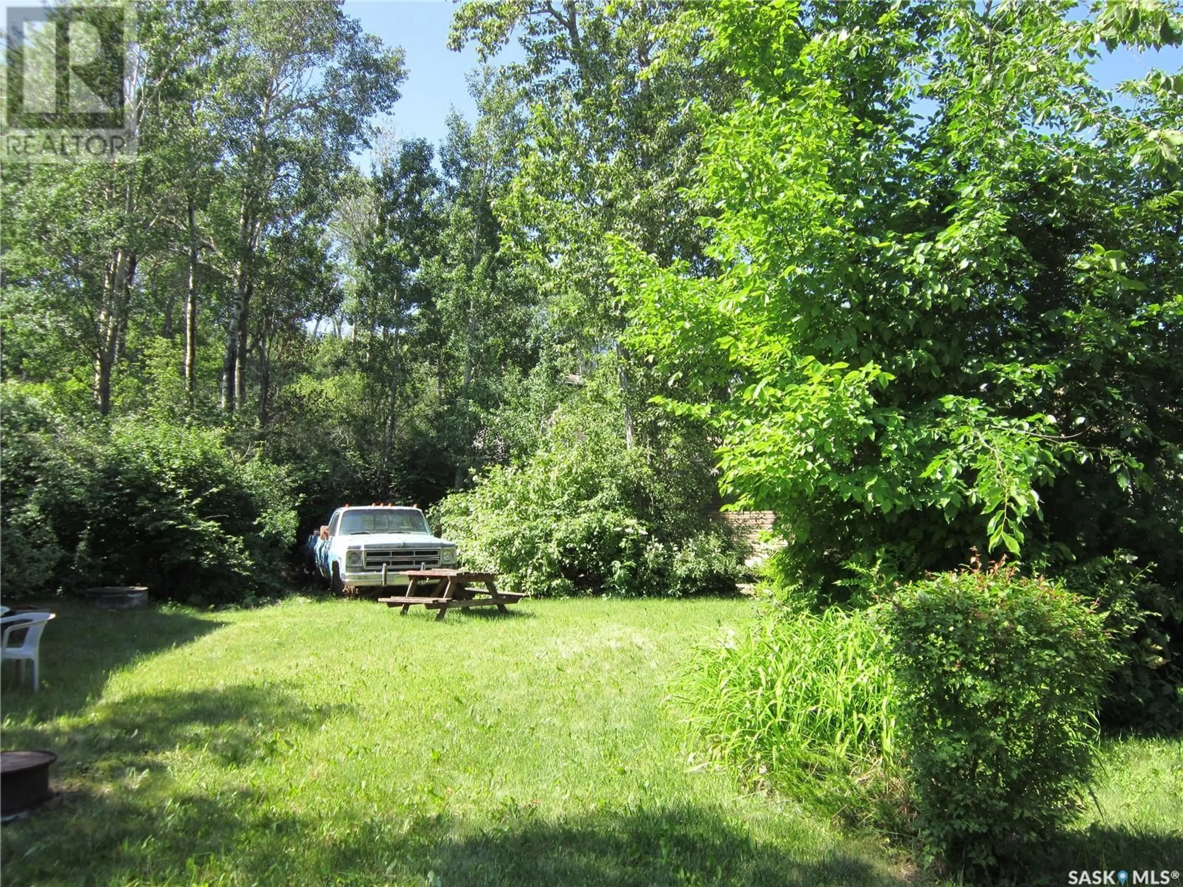 A pic from outside/outdoor area/front of a property/back of a property/a pic from drone, forest/trees view for 5094 DOMREMY BEACH, Wakaw Lake Saskatchewan S0K4P0